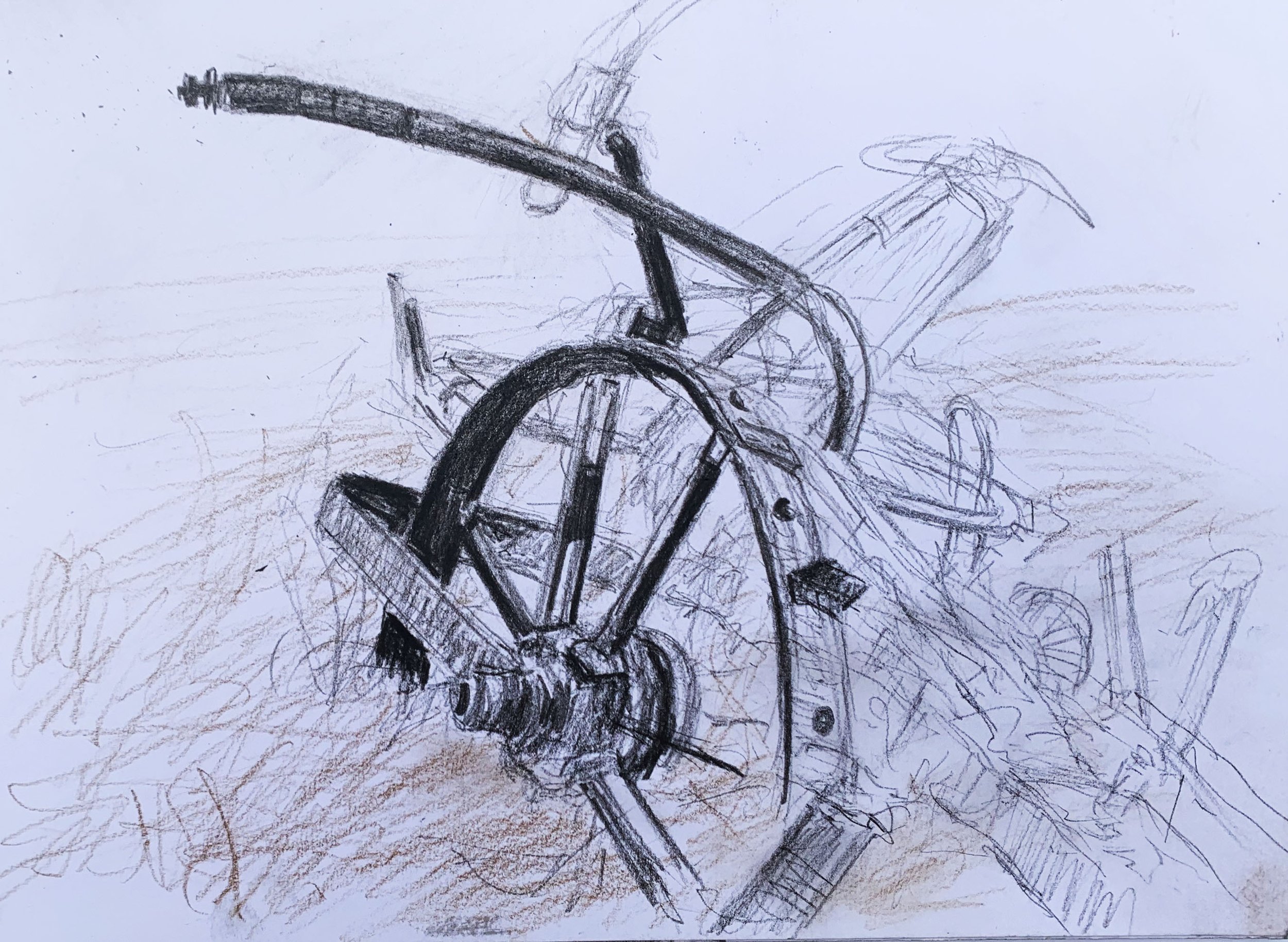 Old rusting plough in the field near our croft