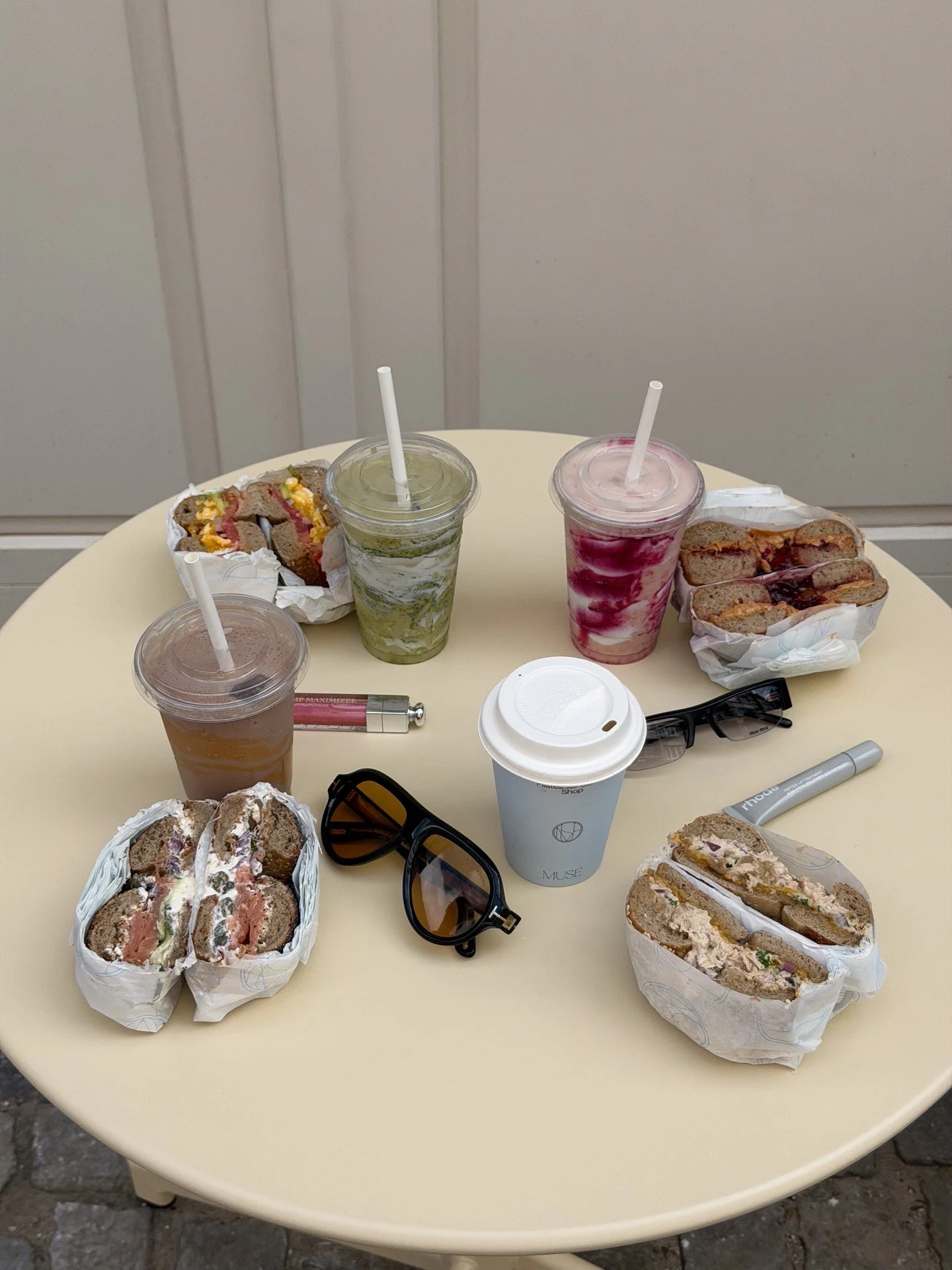 The OG, the Breakkie, the Nutty Berry, the Tuna Melt. Three smoothies and a coffee.

Pull up a chair. Stay a while.
