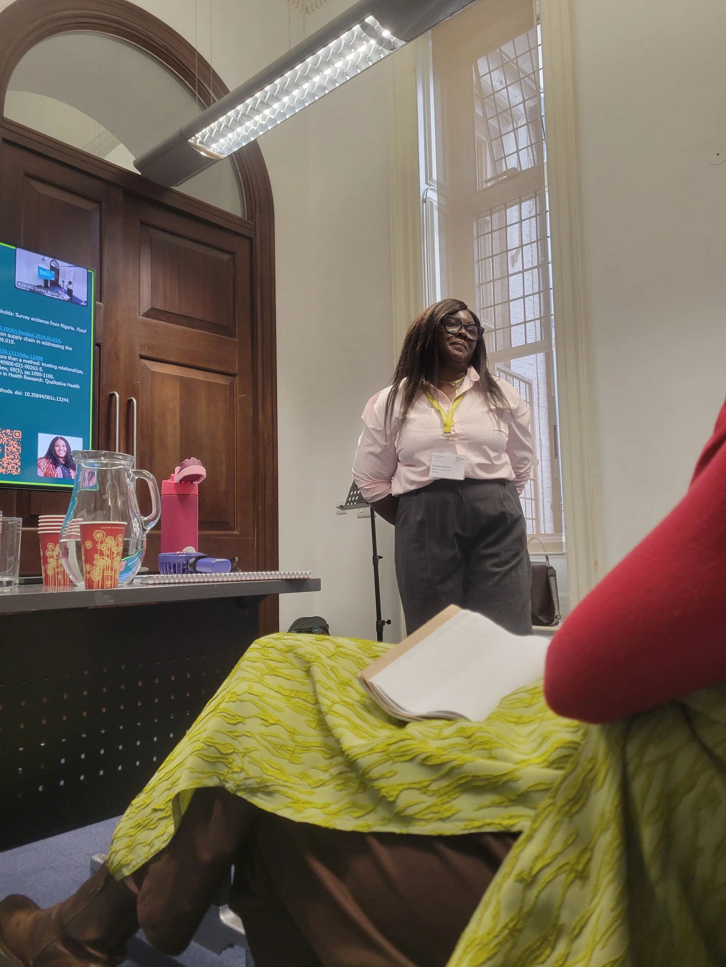 Perpetua presenting her research during the RGS(IBG) 2026 International conference