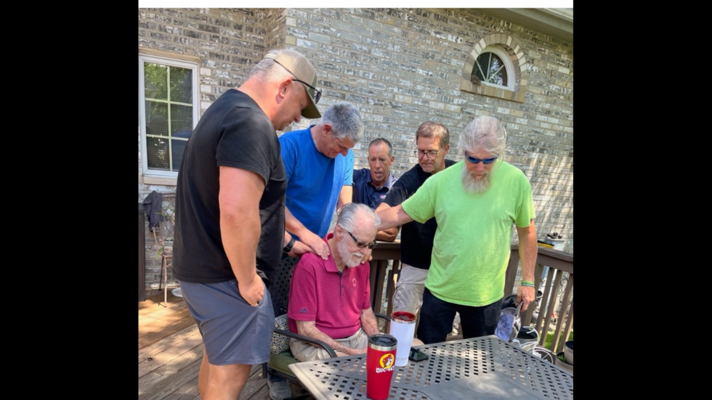 Praying for each other.