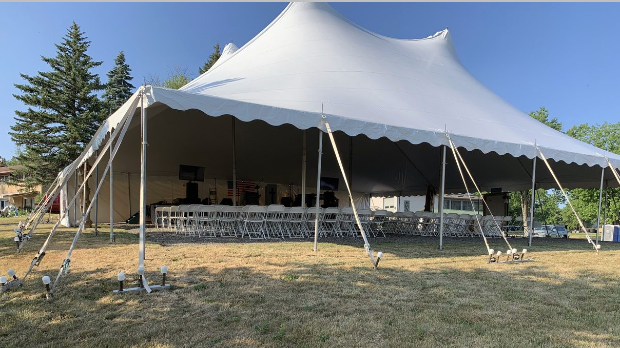 Tent set up outdoors at Puckerville Farms in Lemont, Illinois.