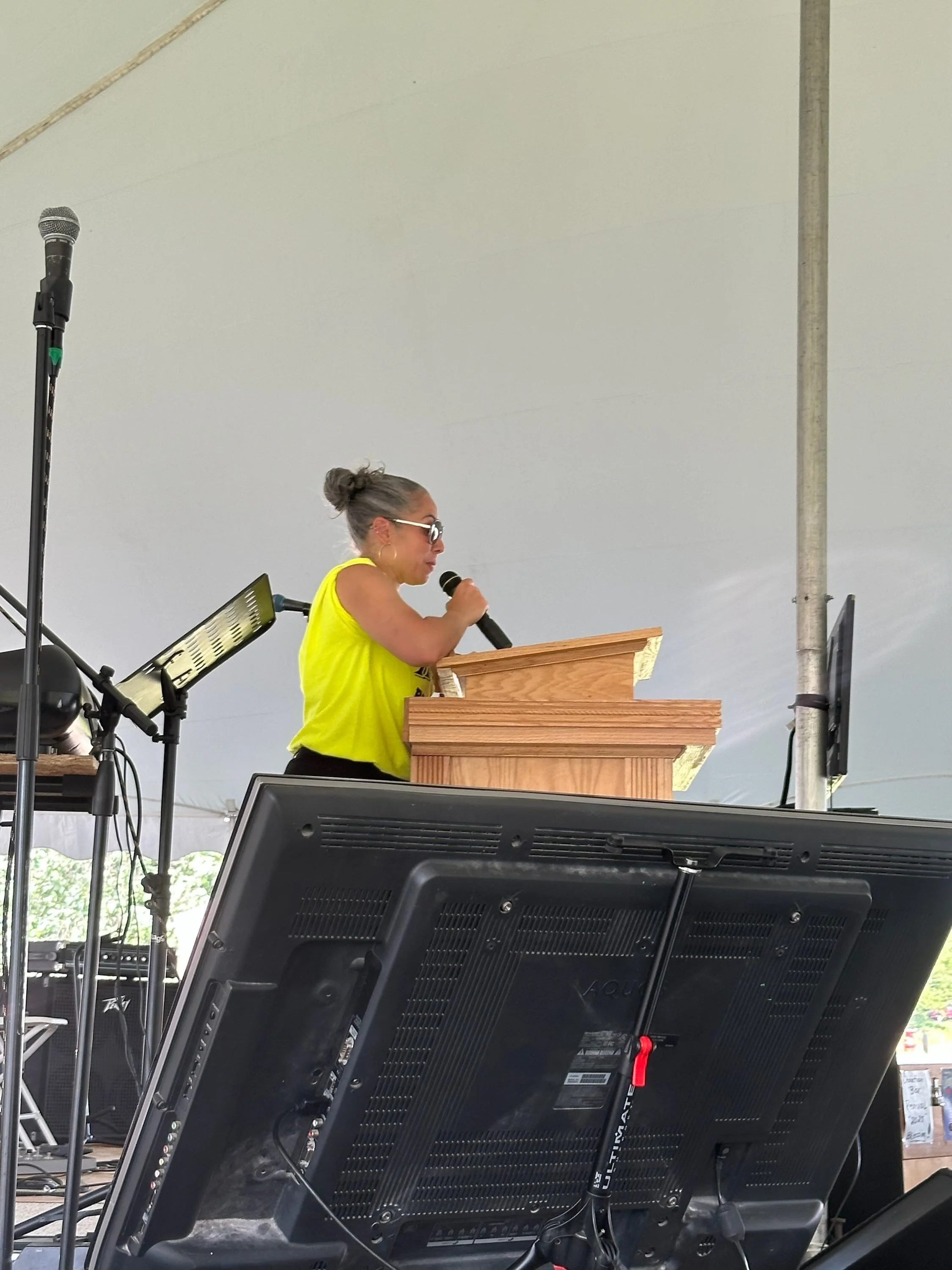 Preaching at revival.