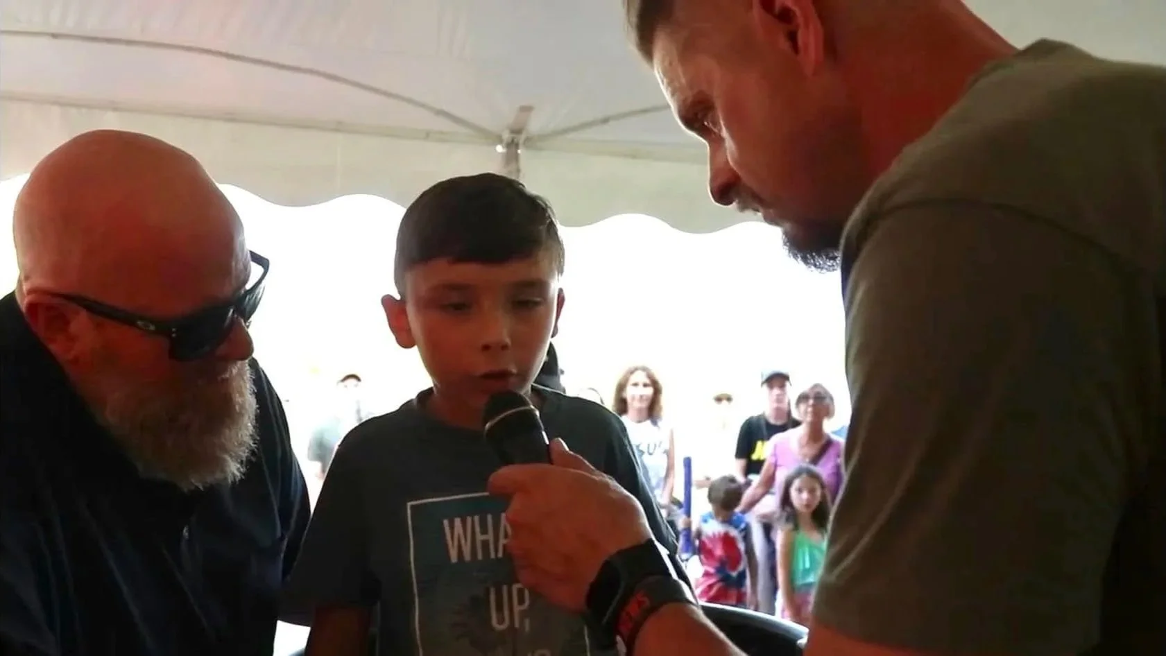 A young boy shares his spiritual experience while at the revival.