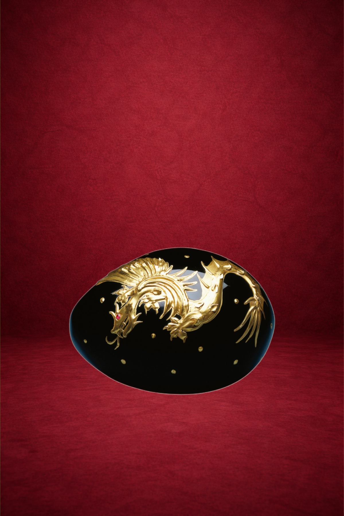 Dragon egg creation by Theo Fabergé inspired by mythical dragons with intricate gold and enamel craftsmanship.