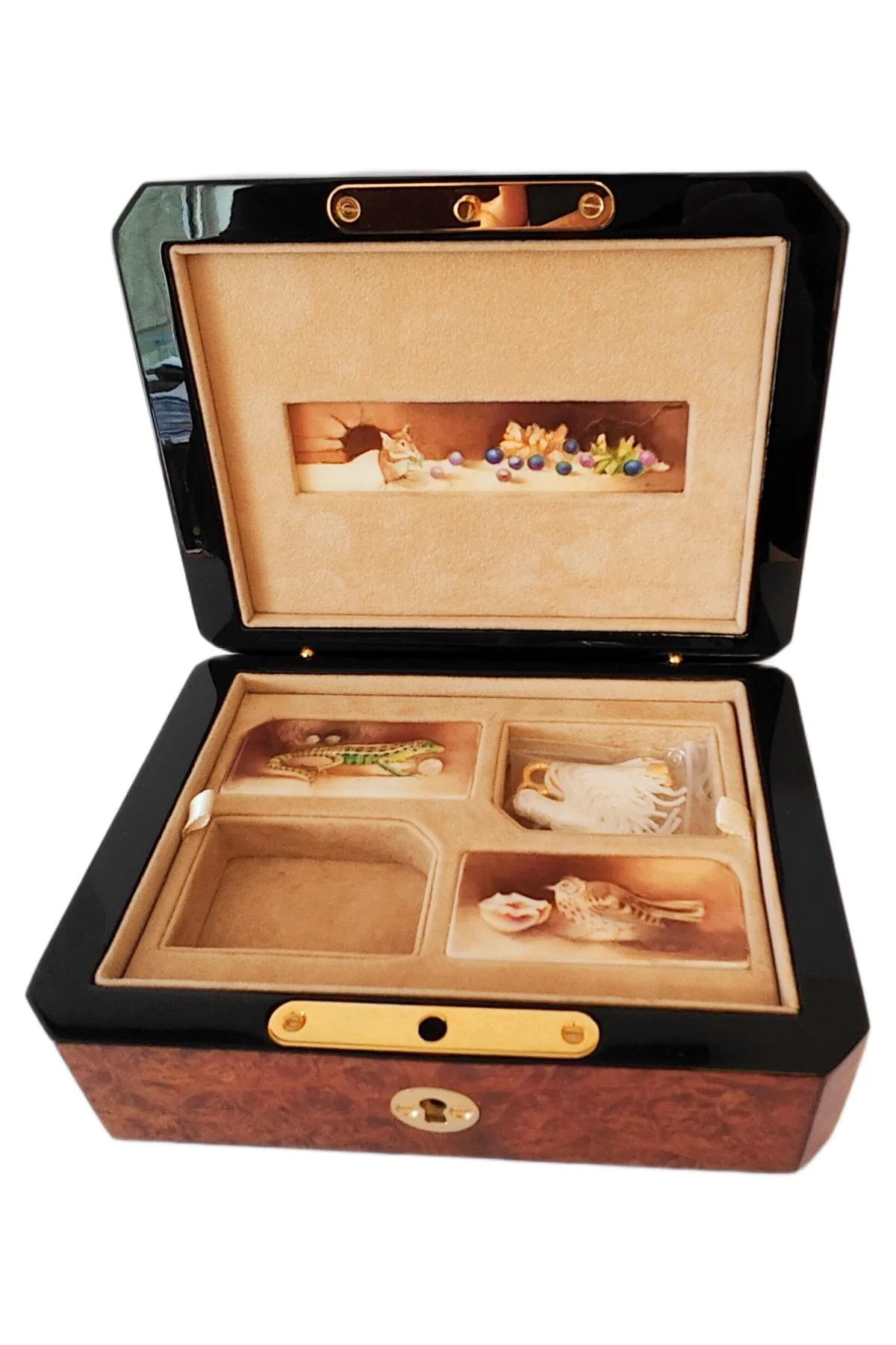 Trilogy Jewel Box open to reveal its handcrafted surprise.