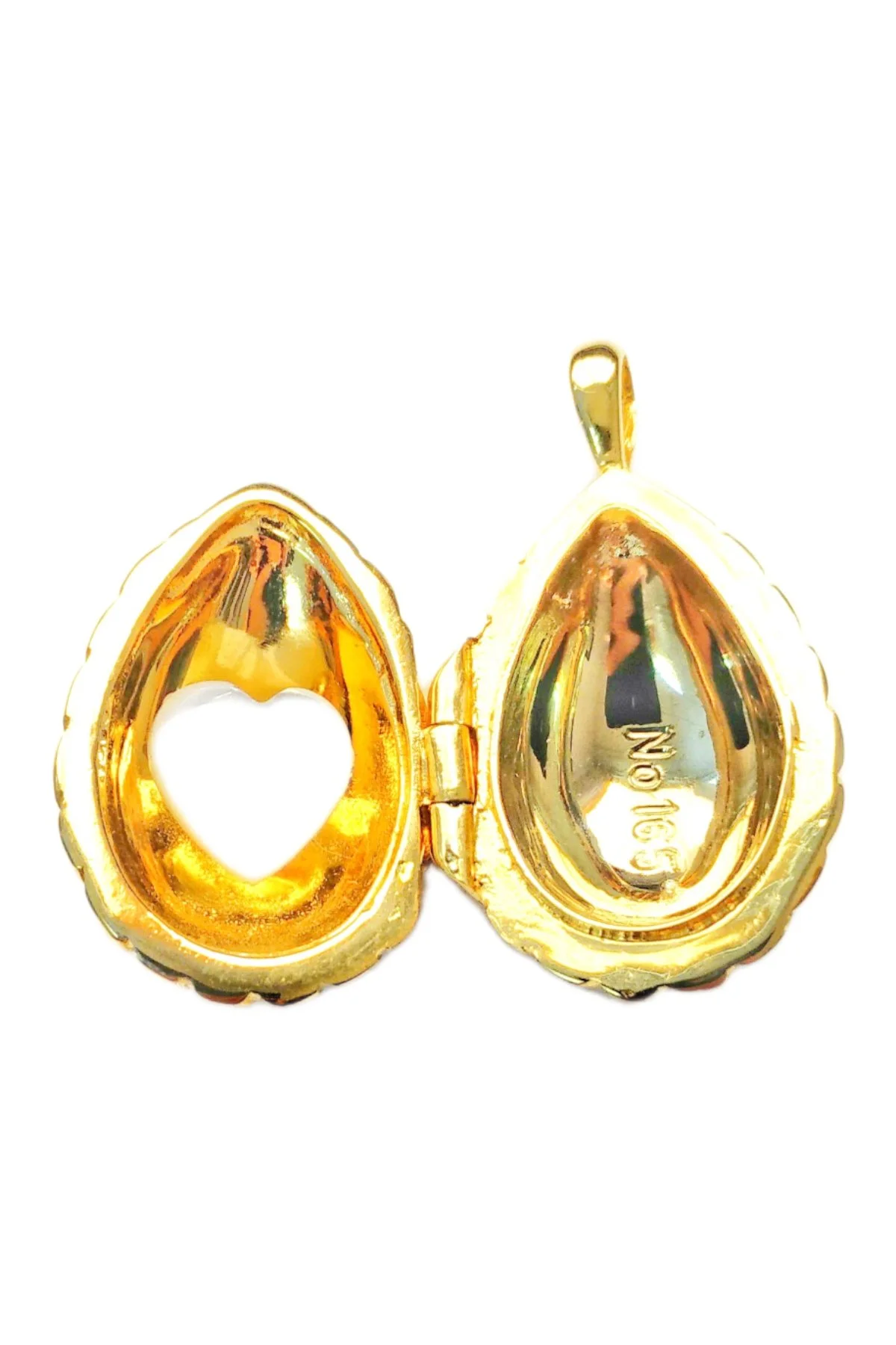 Passion Pendant TFPS901 open to reveal its handcrafted surprise.