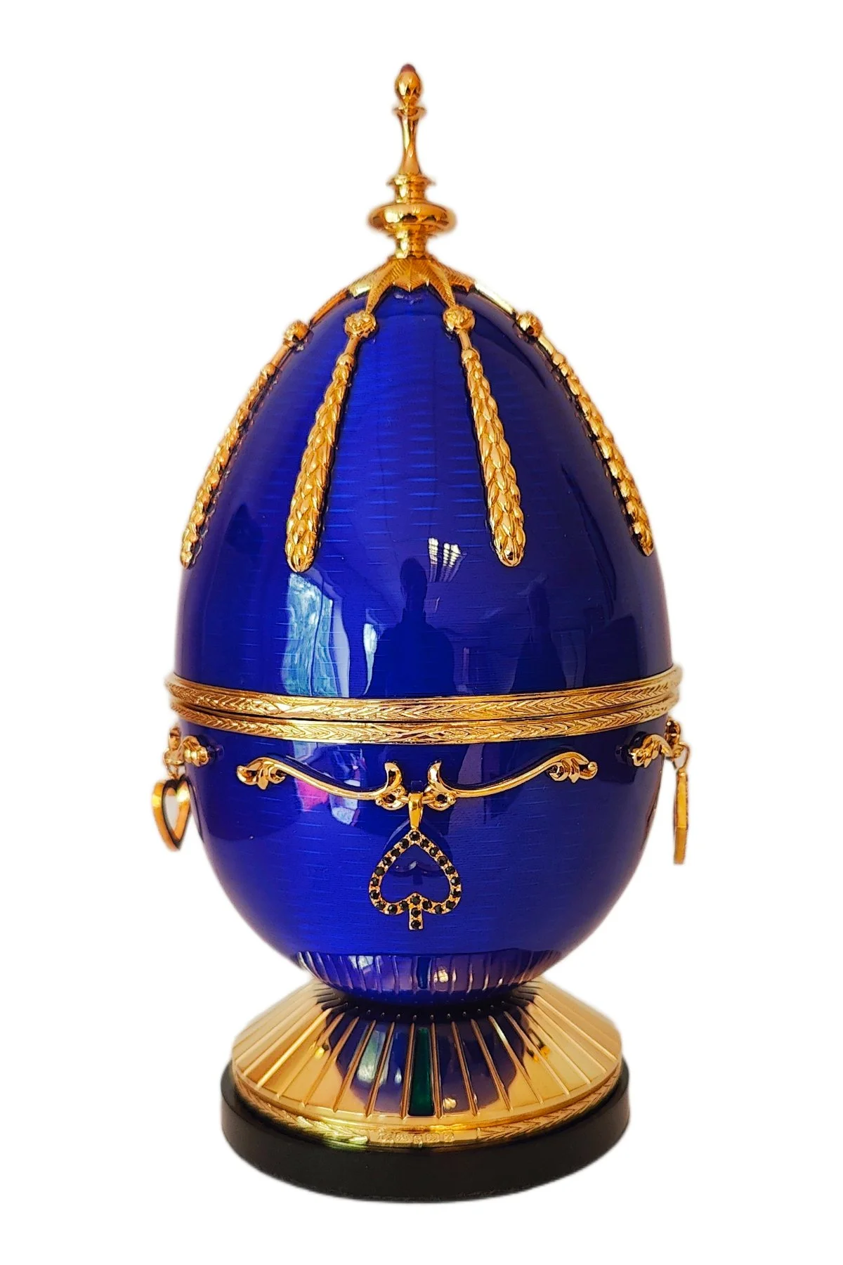 Winners Passion egg creation by Theo Fabergé celebrating victory and achievement with enamel and gold decoration.