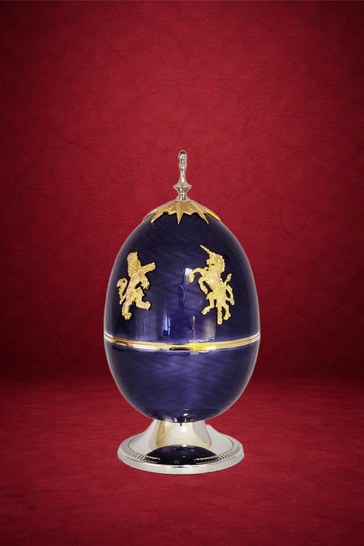 Queen Elizabeth II Platinum Jubilee Egg creation by Theo Fabergé commemorating the historic Mayflower voyage with enamel and gold detailing.