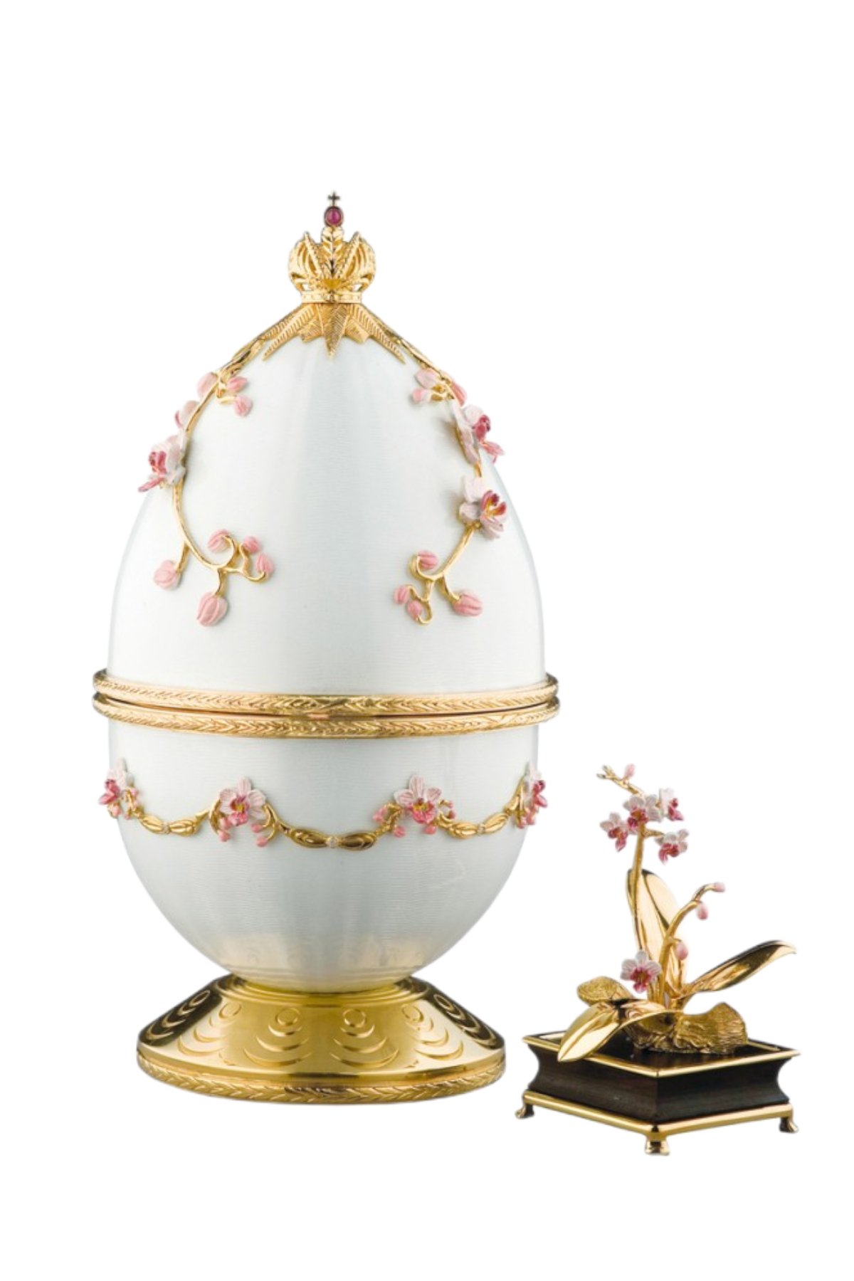 Pink Orchid Egg open to reveal its handcrafted surprise.