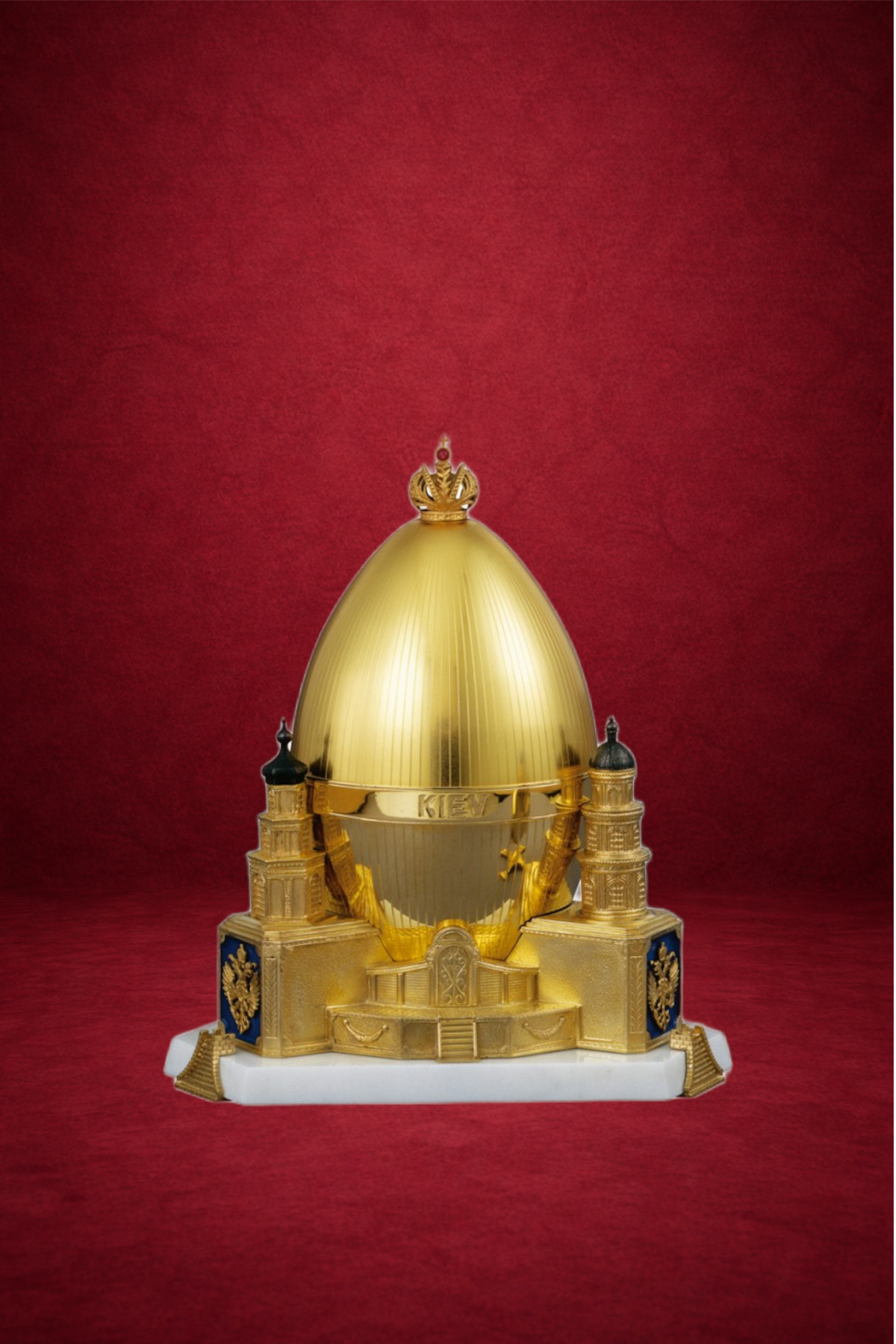 Kiev Egg creation by Theo Fabergé inspired by the Russian Firebird legend crafted with vibrant enamel and gold.