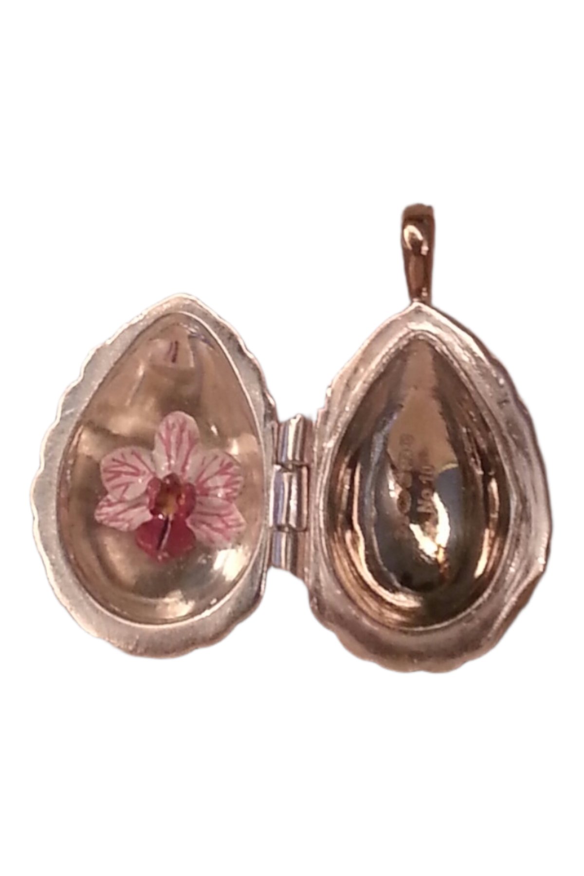 Passion Pendant TFPS953 open to reveal its handcrafted surprise.