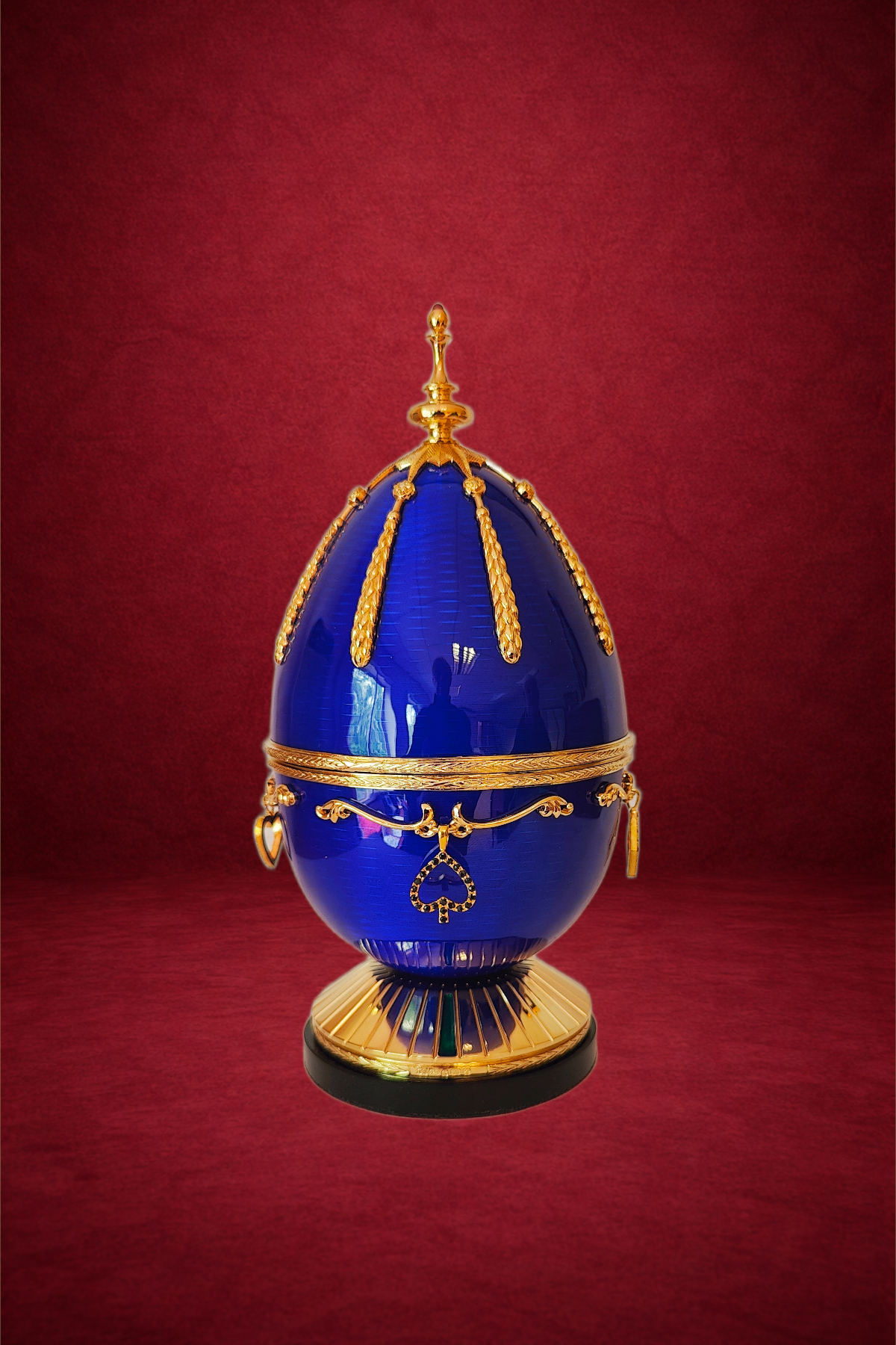Winners Passion egg creation by Theo Fabergé celebrating victory and achievement with enamel and gold decoration.