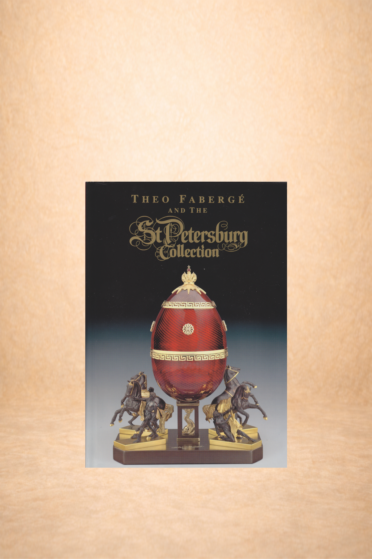 A brochure titled 'Theo Fabergé and the St. Petersburg Collection' with an image of a decorative Fabergé egg, ornate in red and gold, surrounded by mounted horse figurines on a wooden base.
