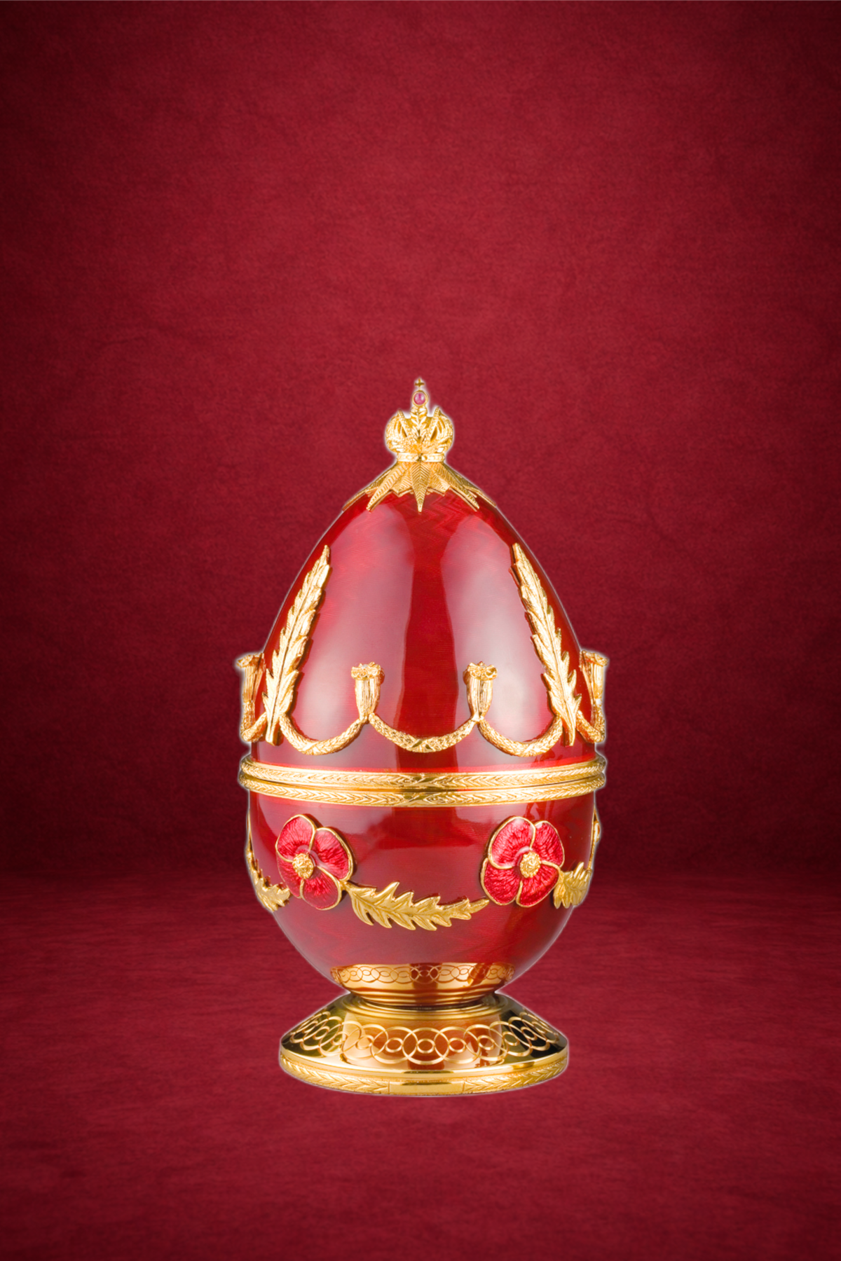 Poppy Egg creation by Theo Fabergé featuring romantic bird motifs crafted with gold and enamel.