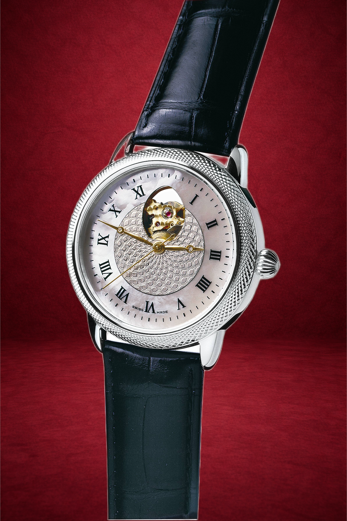 Theo Fabergé Series 3 chronometer model TF301 featuring a mother of pearl dial, sterling silver case and bezel with signature Fabergé egg cut-out revealing the Swiss automatic movement