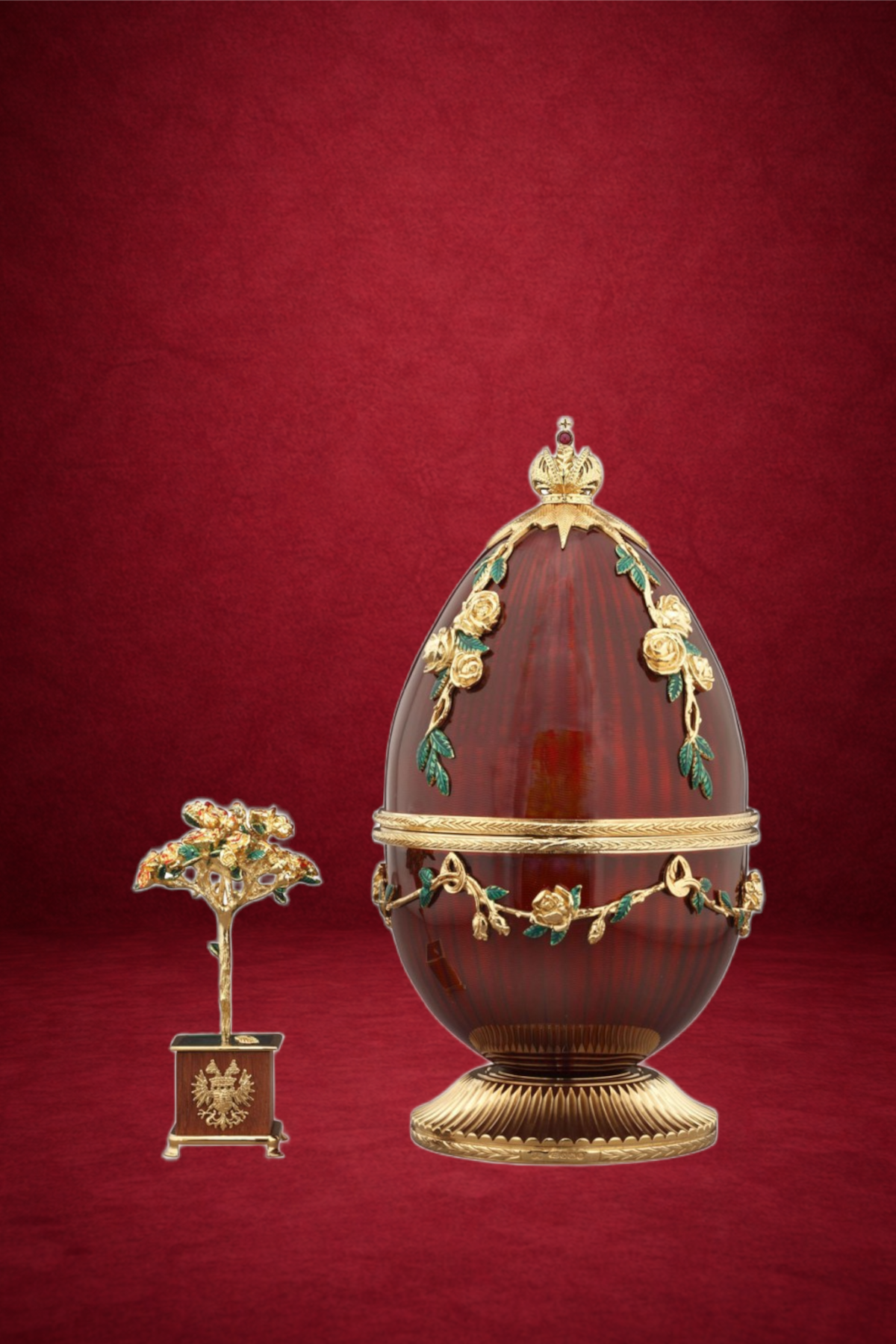 Red Rose Egg creation by Theo Fabergé inspired by orchid flowers crafted in enamel and gold.