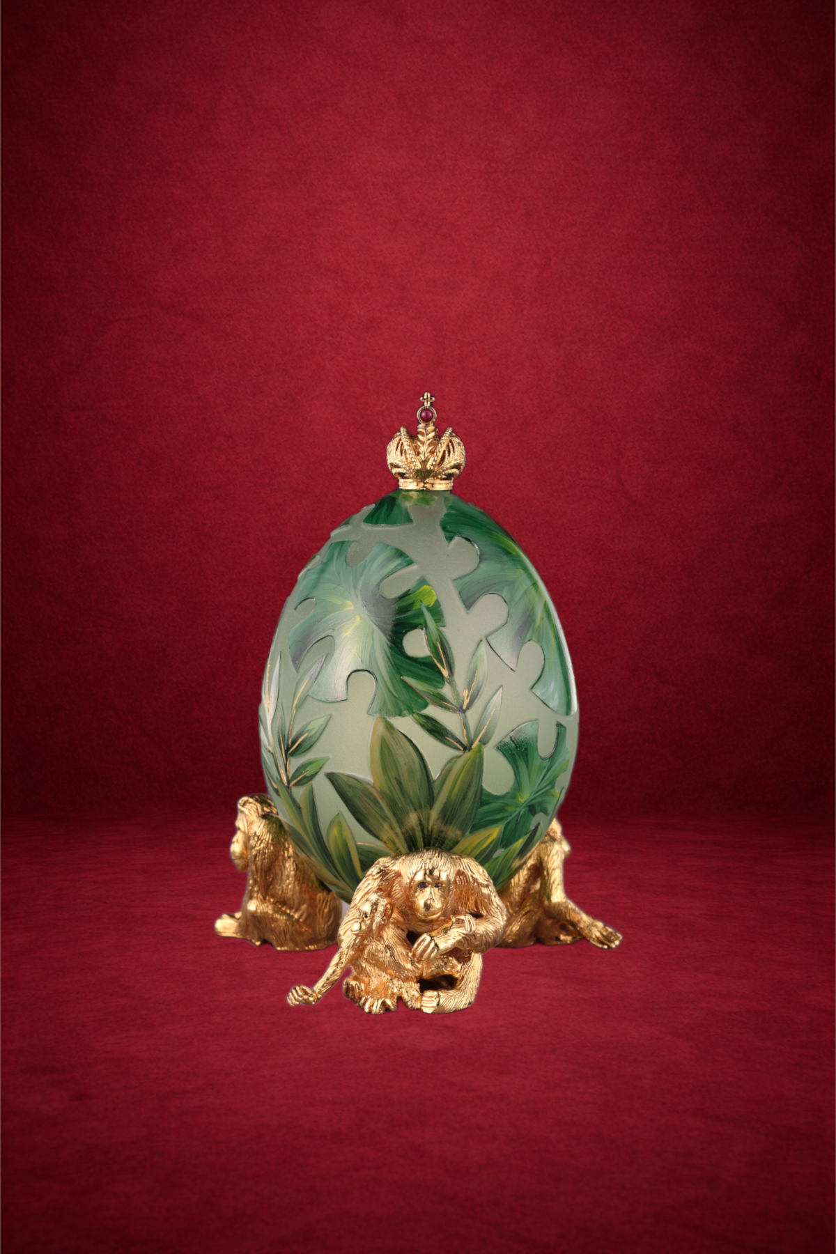 Jungle egg creation by Theo Fabergé inspired by exotic jungle wildlife crafted in enamel and gold.