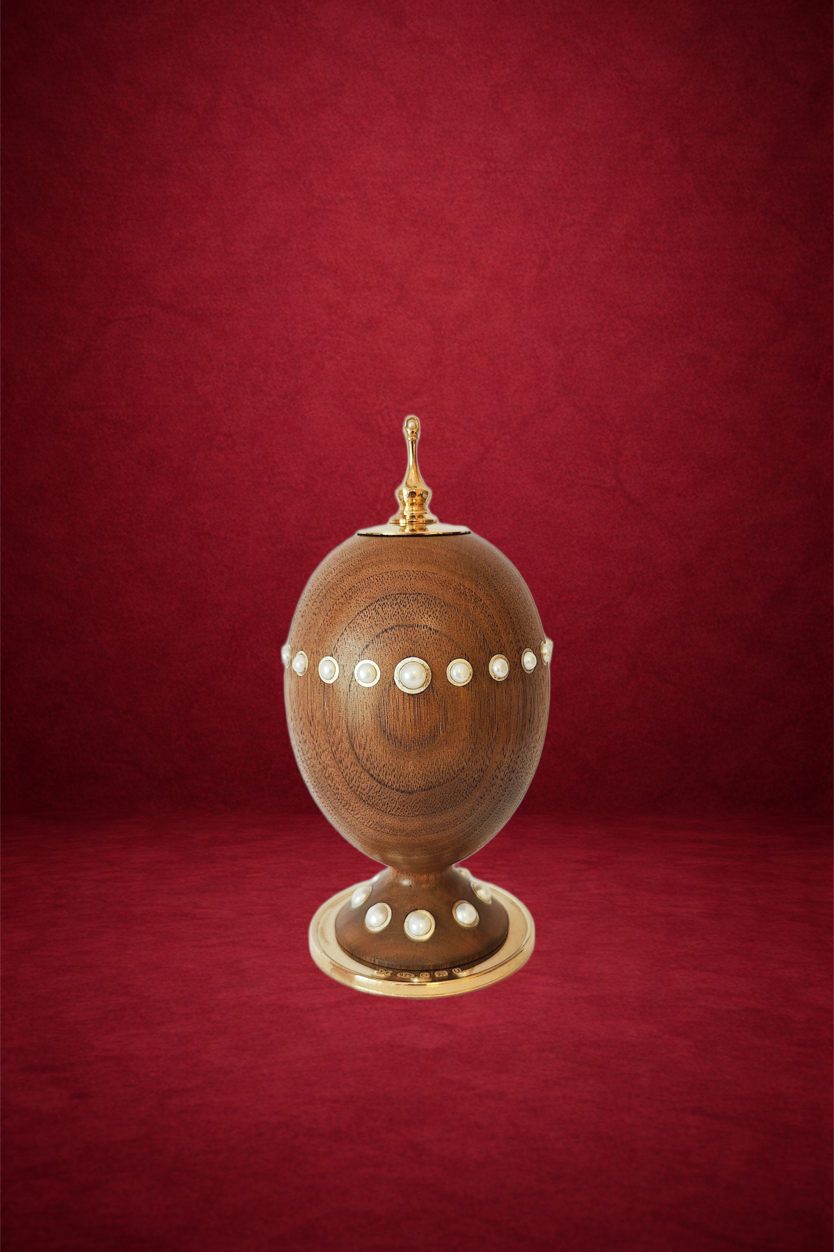 Pearl egg creation by Theo Fabergé featuring pearl-inspired design with elegant enamel and gold craftsmanship.