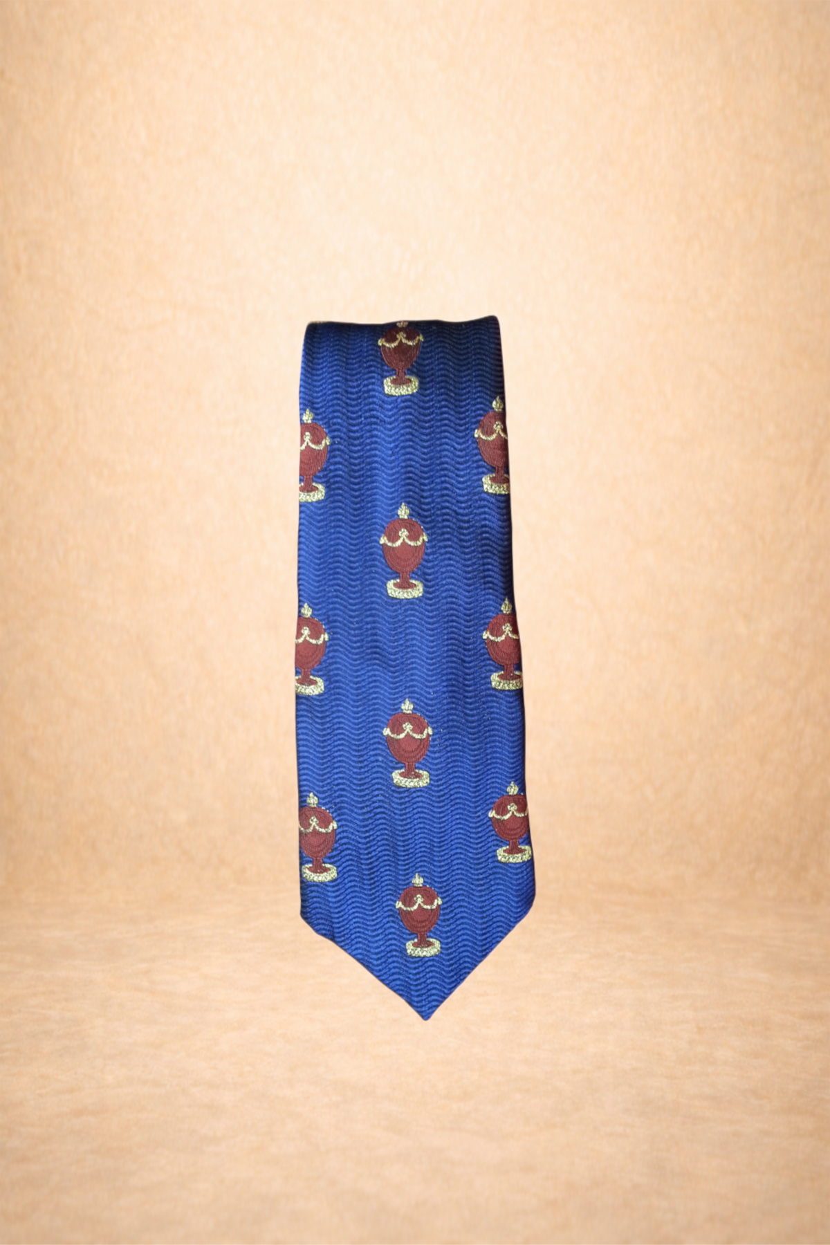 Blue necktie with red and gold urn pattern