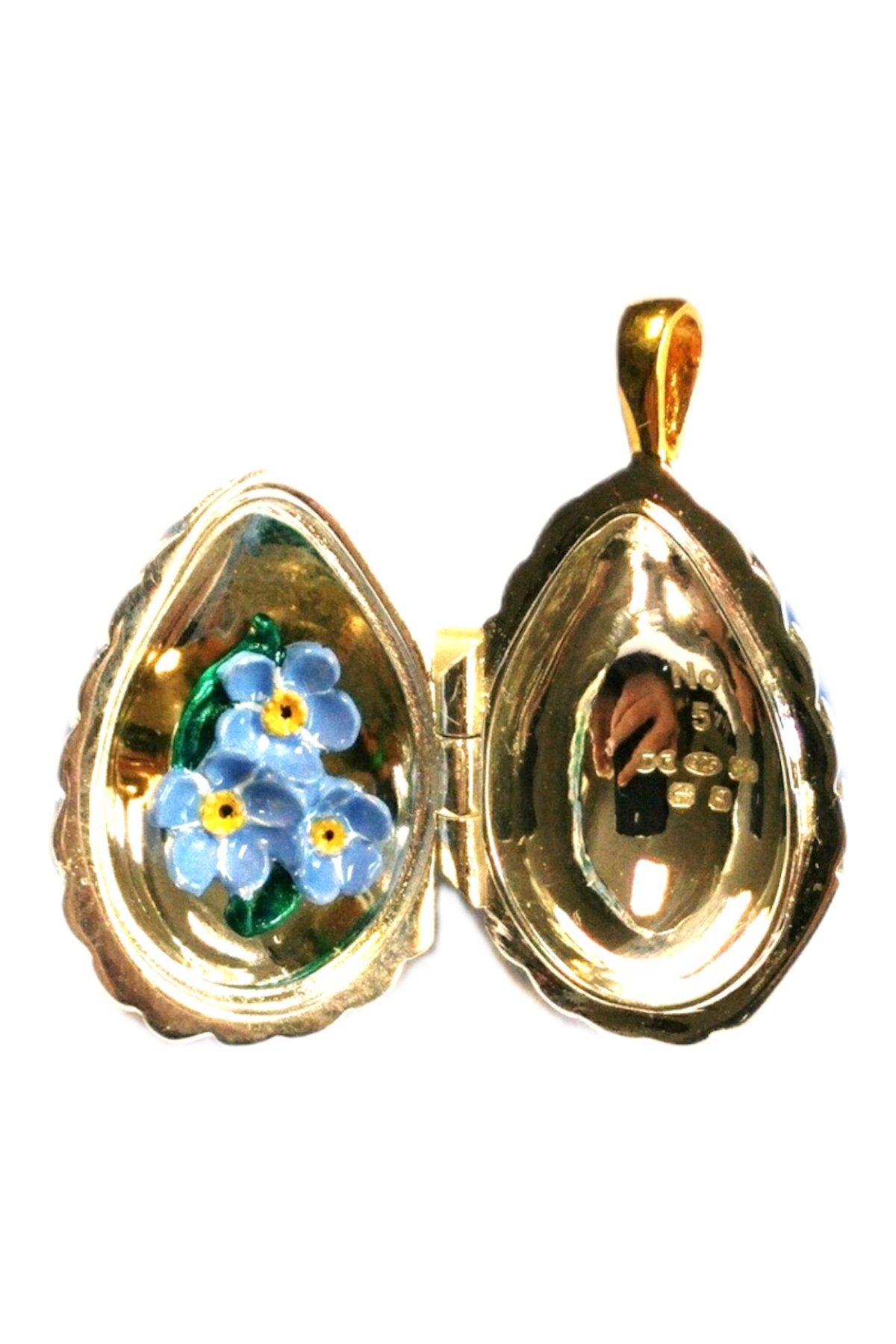 Passion Pendant TFPS957 open to reveal its handcrafted surprise.