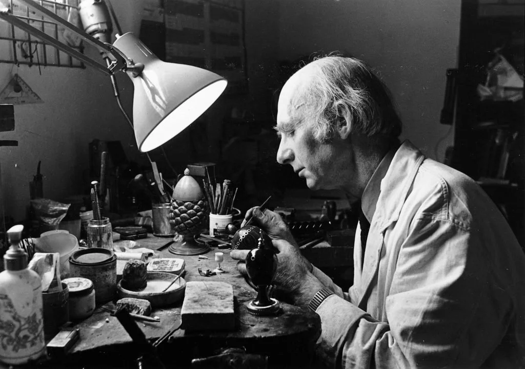 Theo Fabergé working by hand at his studio bench in 1984.
