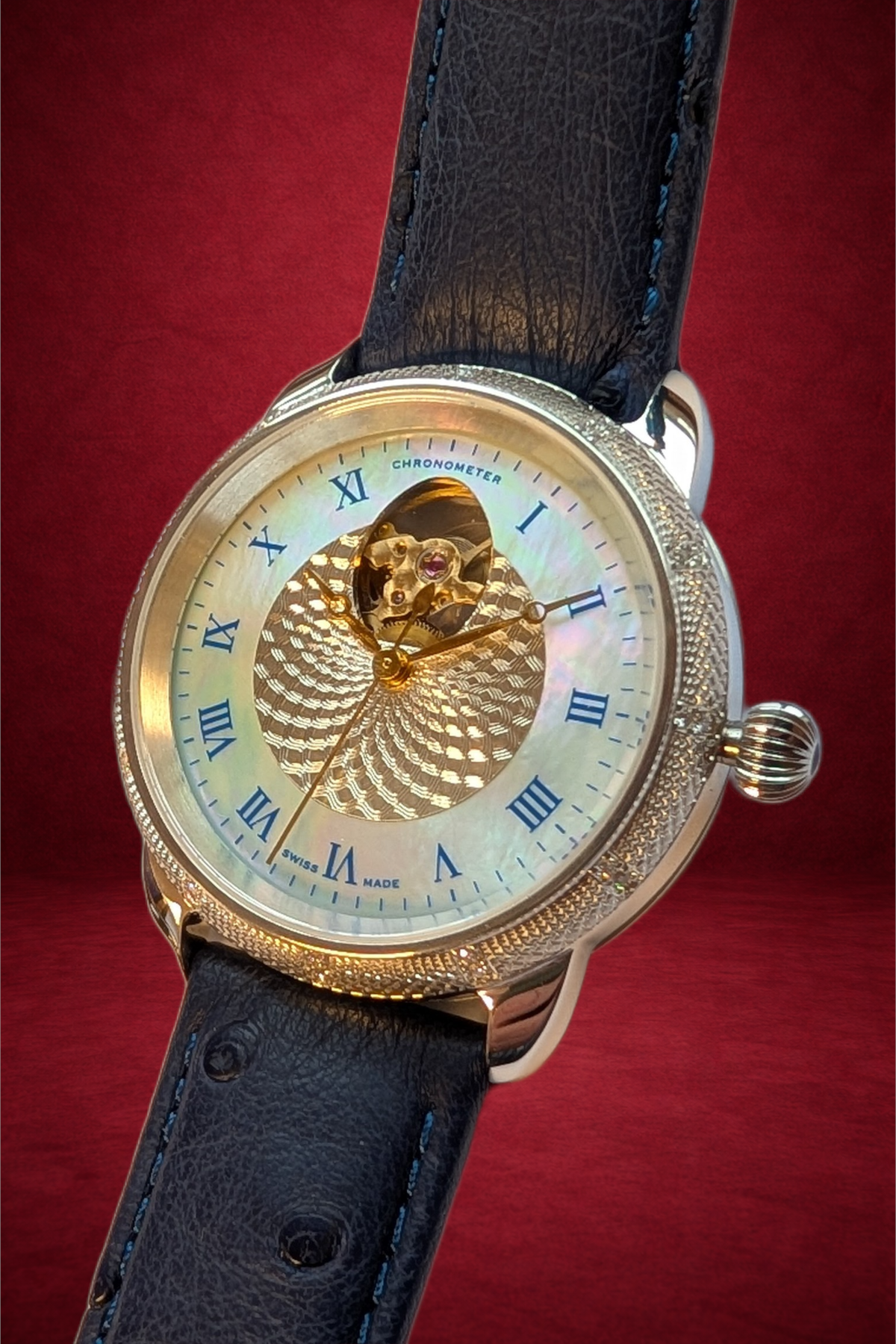 Theo Fabergé Series 4 chronometer model TF411 with 18 kt yellow gold bezel, sterling silver case and blue enamel dial featuring the Fabergé egg cut-out display.