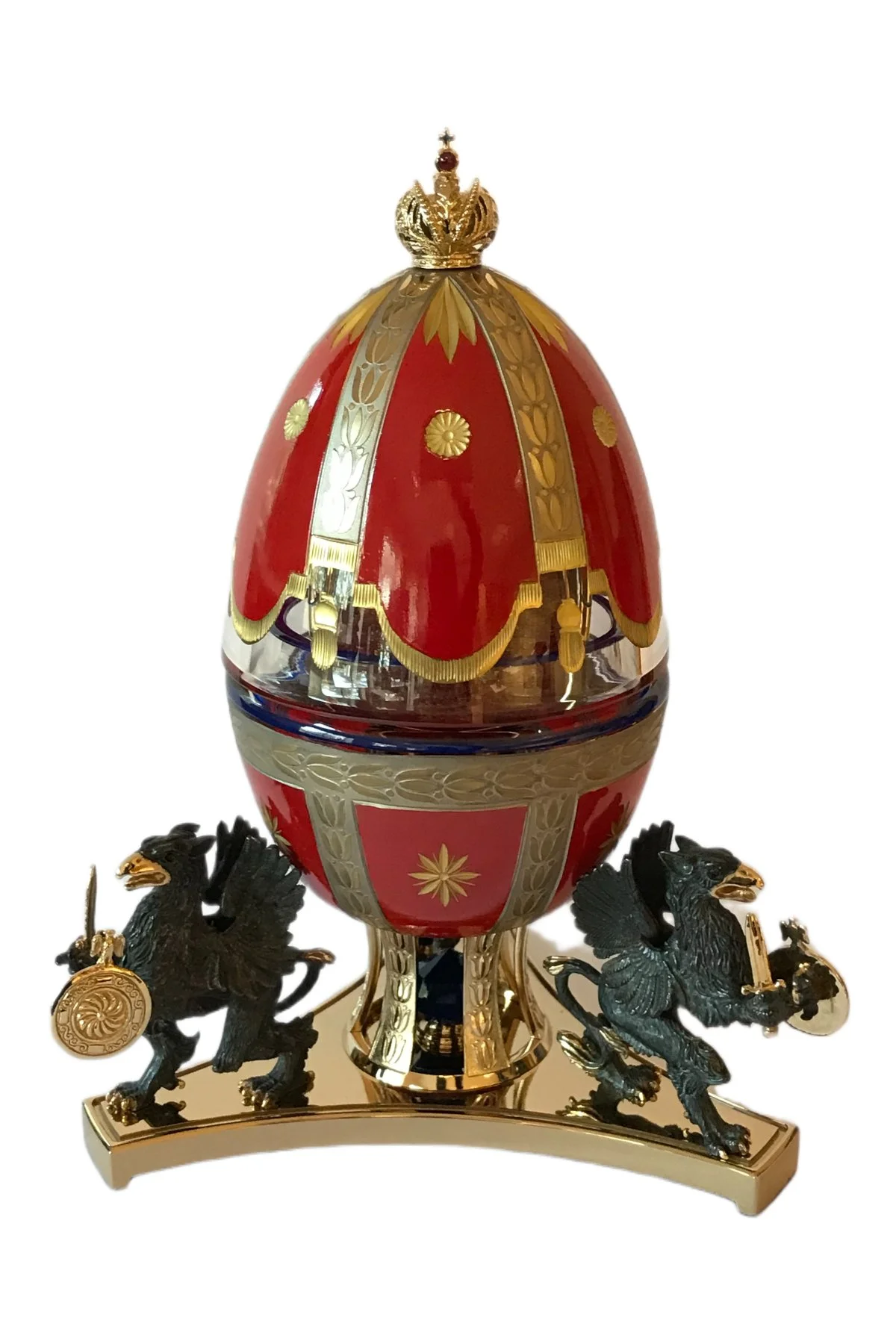 Imperial Romanov egg creation by Theo Fabergé celebrating the Romanov dynasty with elaborate enamel and gold decoration.