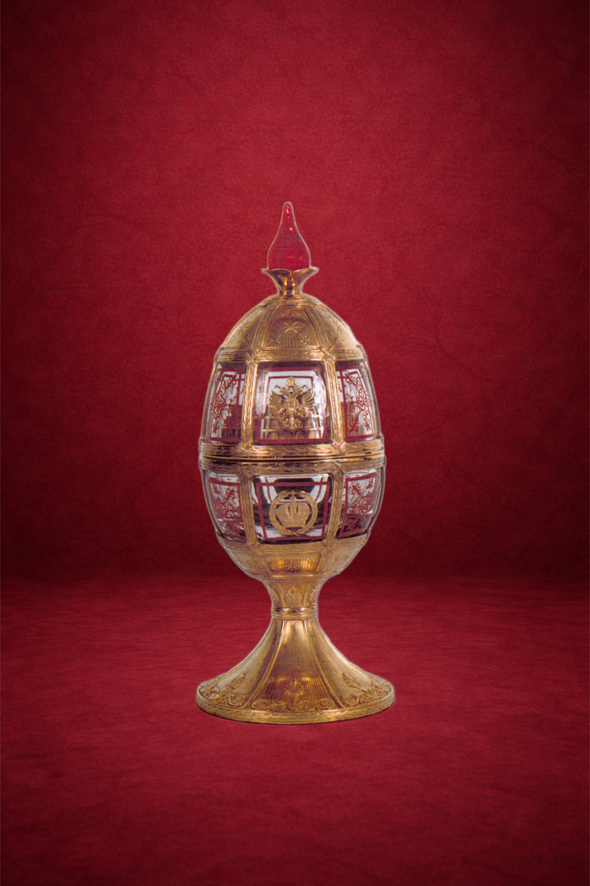 Olympic egg creation by Theo Fabergé inspired by the Olympic Games with gold and enamel decorative motifs.