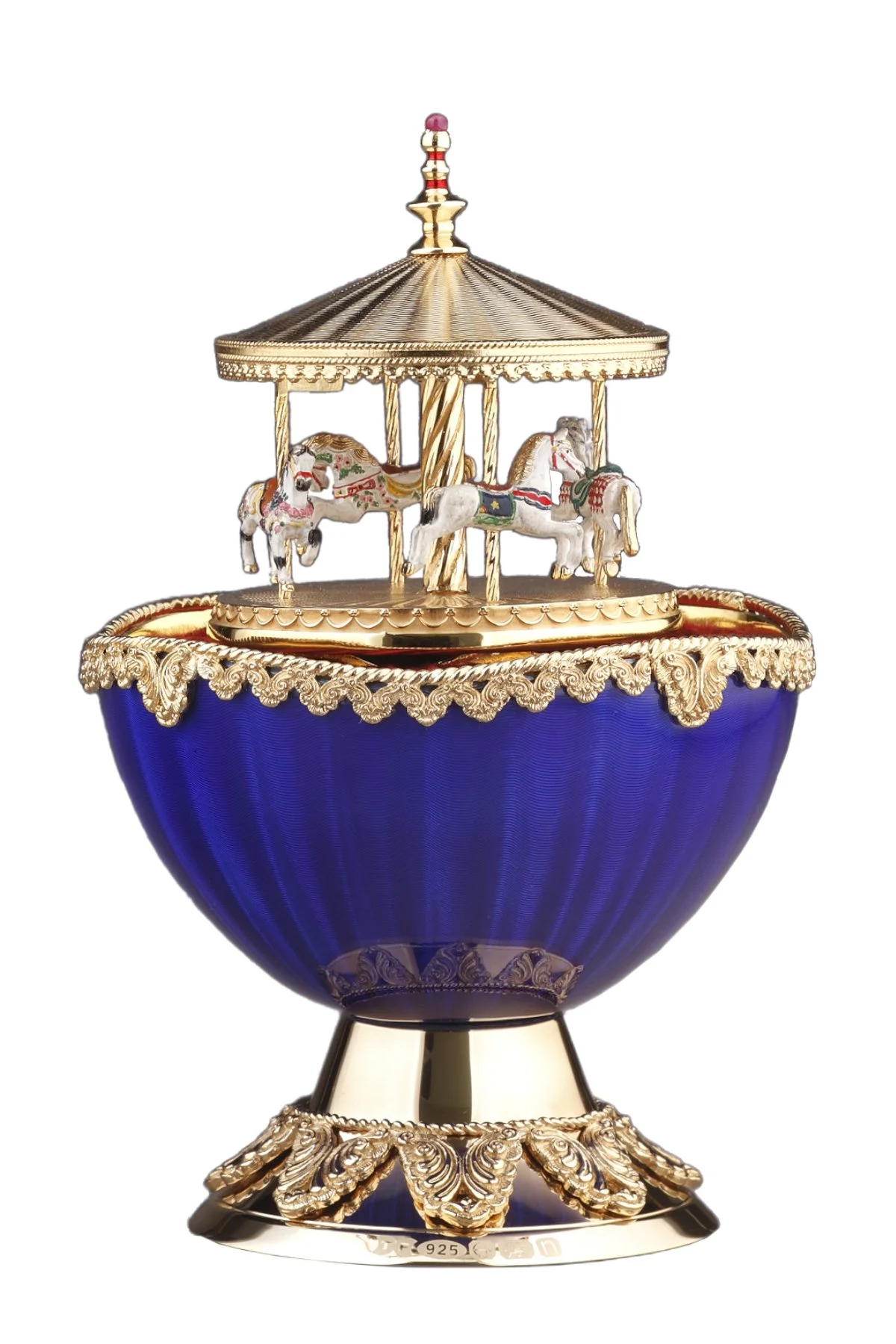 Carousel Egg open to reveal its handcrafted surprise.