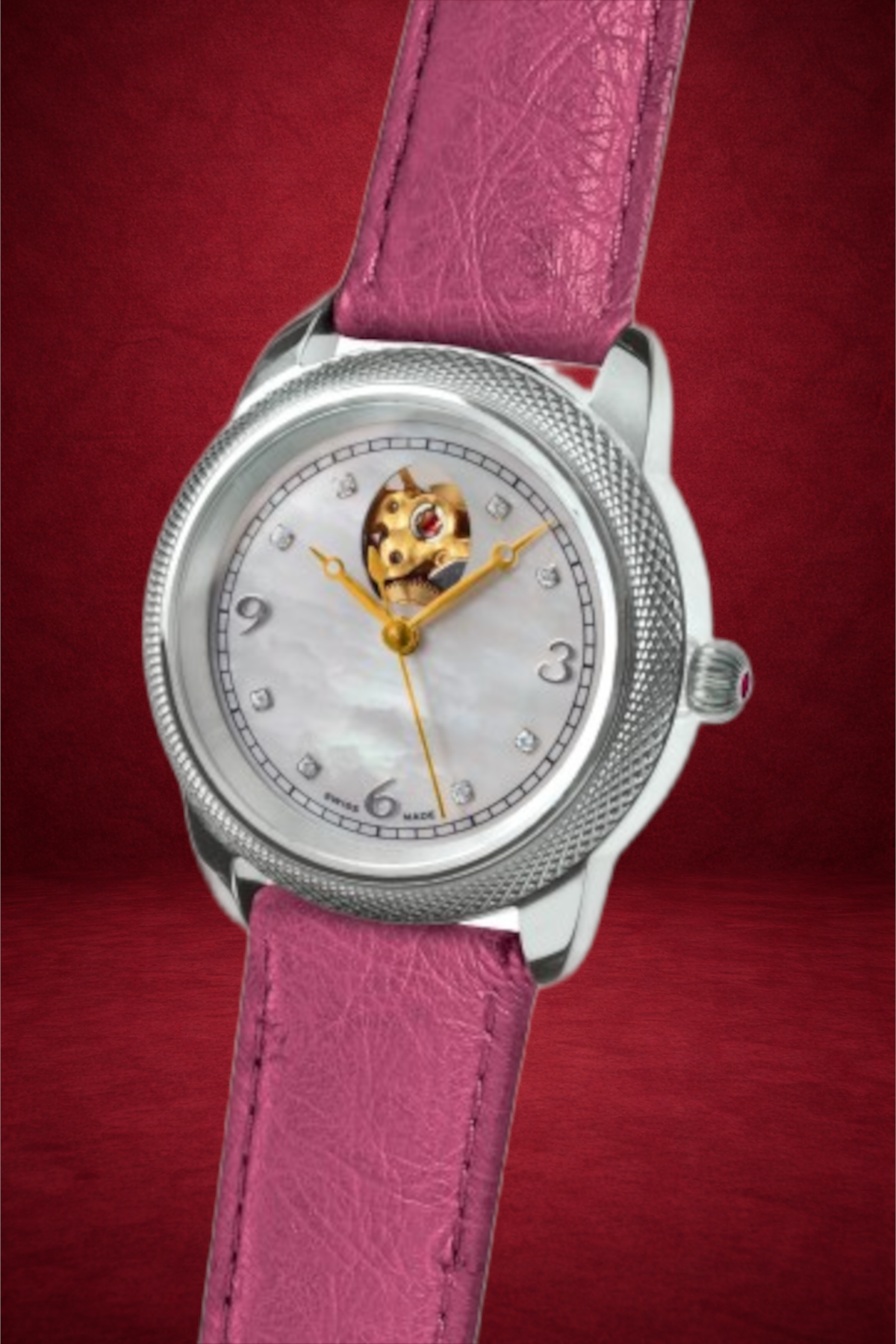 Theo Fabergé Series 8 ladies watch model TF801 with mother of pearl dial, sterling silver case and bezel, diamond hour markers and signature Fabergé egg cut-out.