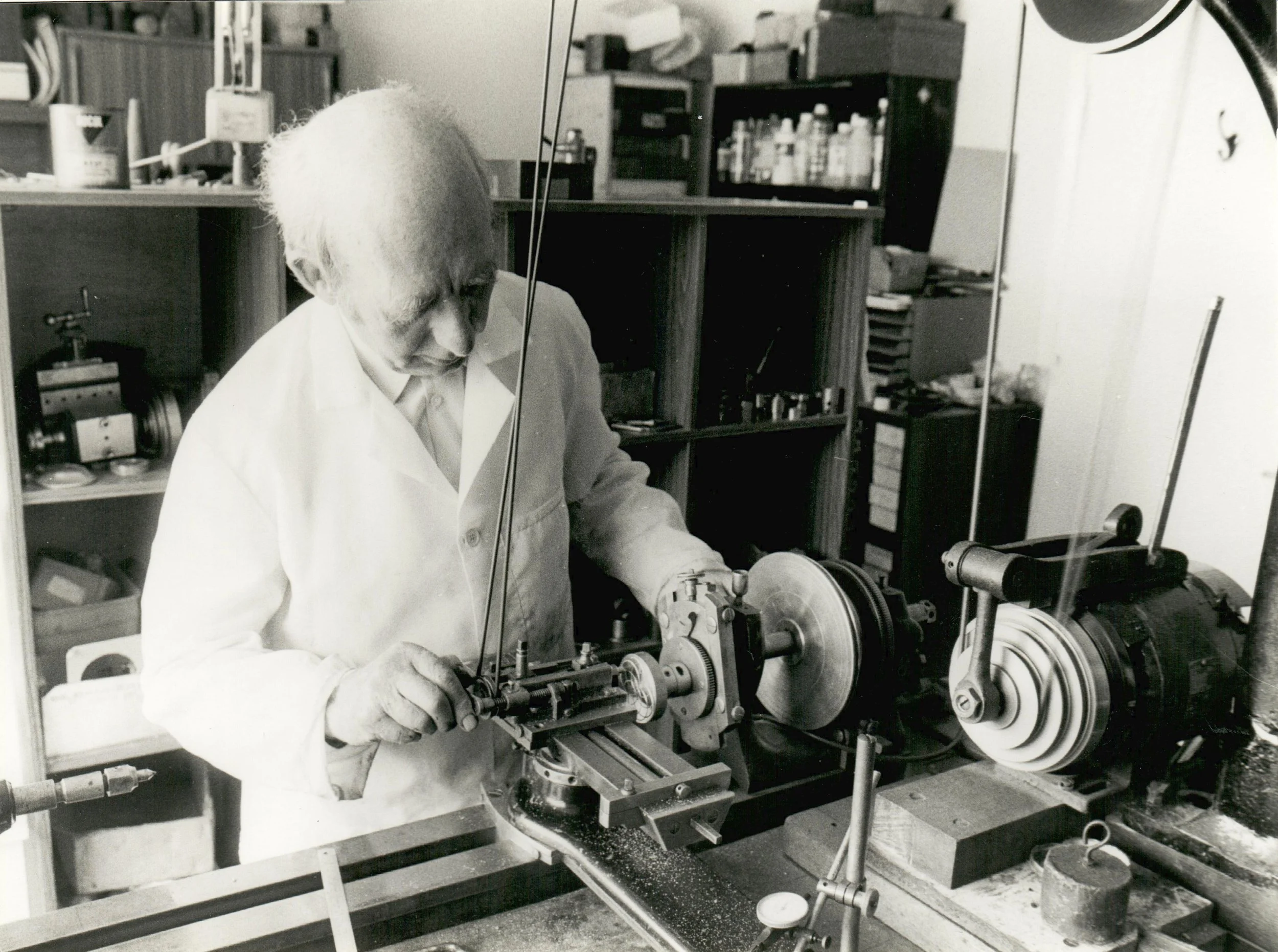 Theo Fabergé in his workshop, working at an ornamental turning lathe.