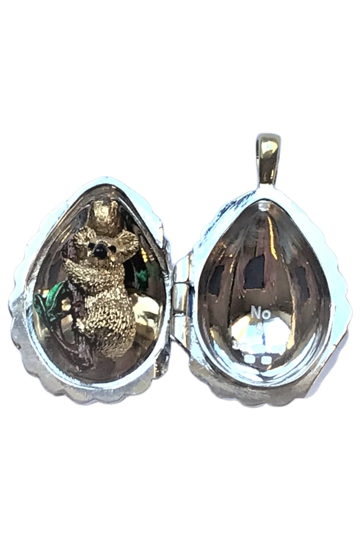 Passion Pendant TFPS960 open to reveal its handcrafted surprise.