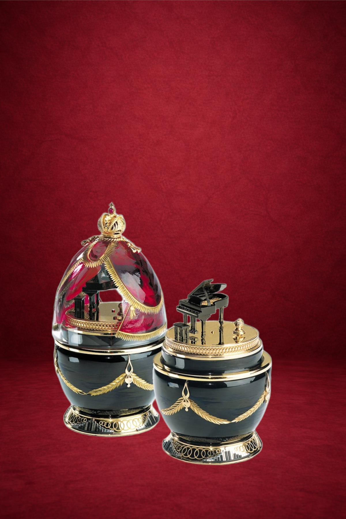 Piano Egg creation by Theo Fabergé inspired by exotic jungle wildlife crafted in enamel and gold.