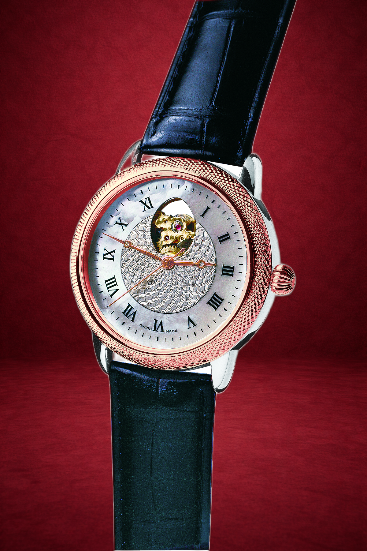 Theo Fabergé Series 4 chronometer model TF402 featuring 18 kt rose gold bezel, sterling silver case and mother of pearl dial with signature Fabergé egg cut-out display.