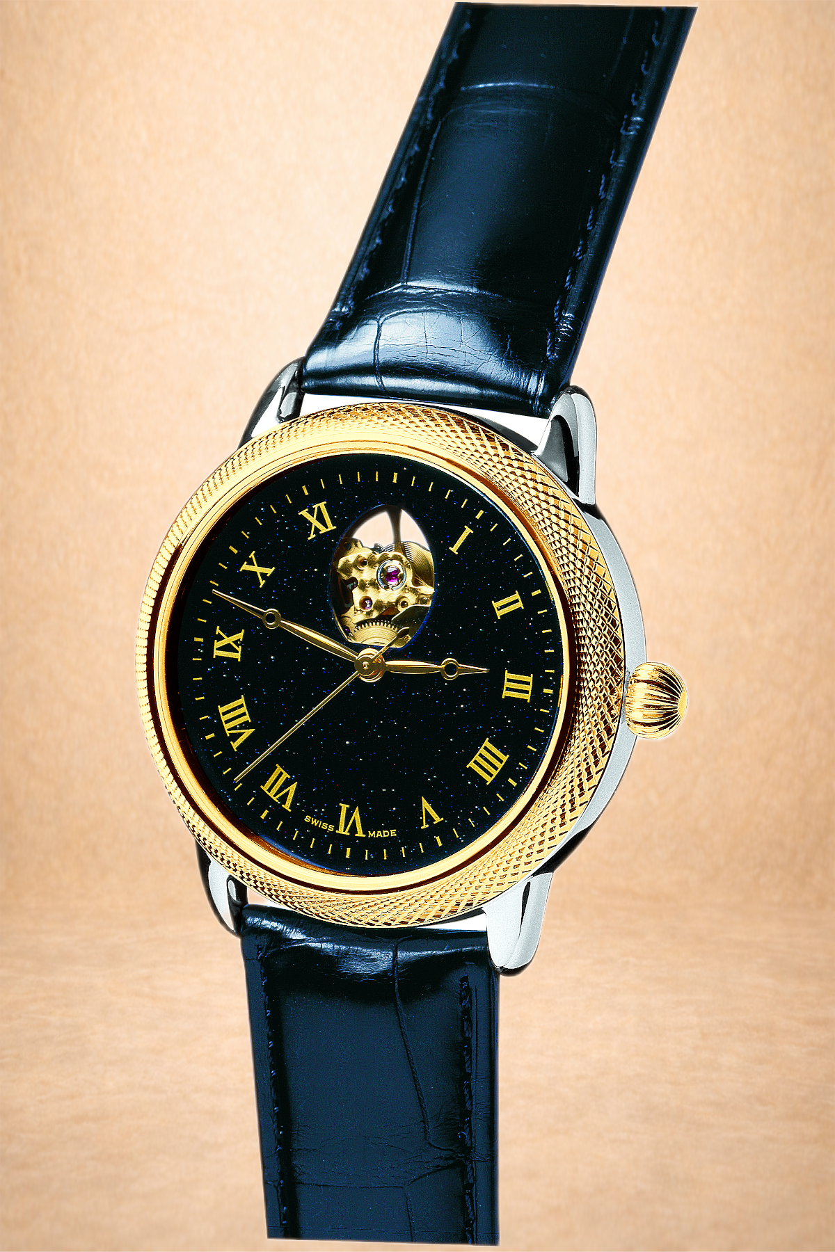 A luxury wristwatch with a black dial, gold bezel, and black leather strap, featuring Roman numerals and an open heart display showing the watch's internal mechanism.