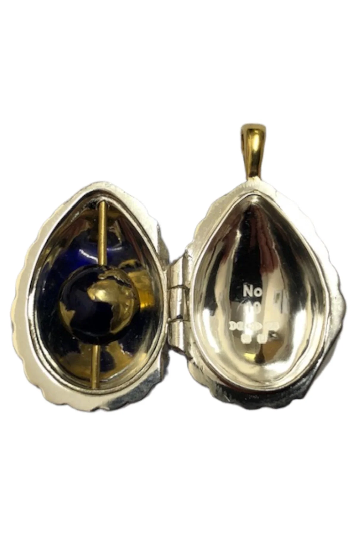 Passion Pendant TFPS959 open to reveal its handcrafted surprise.