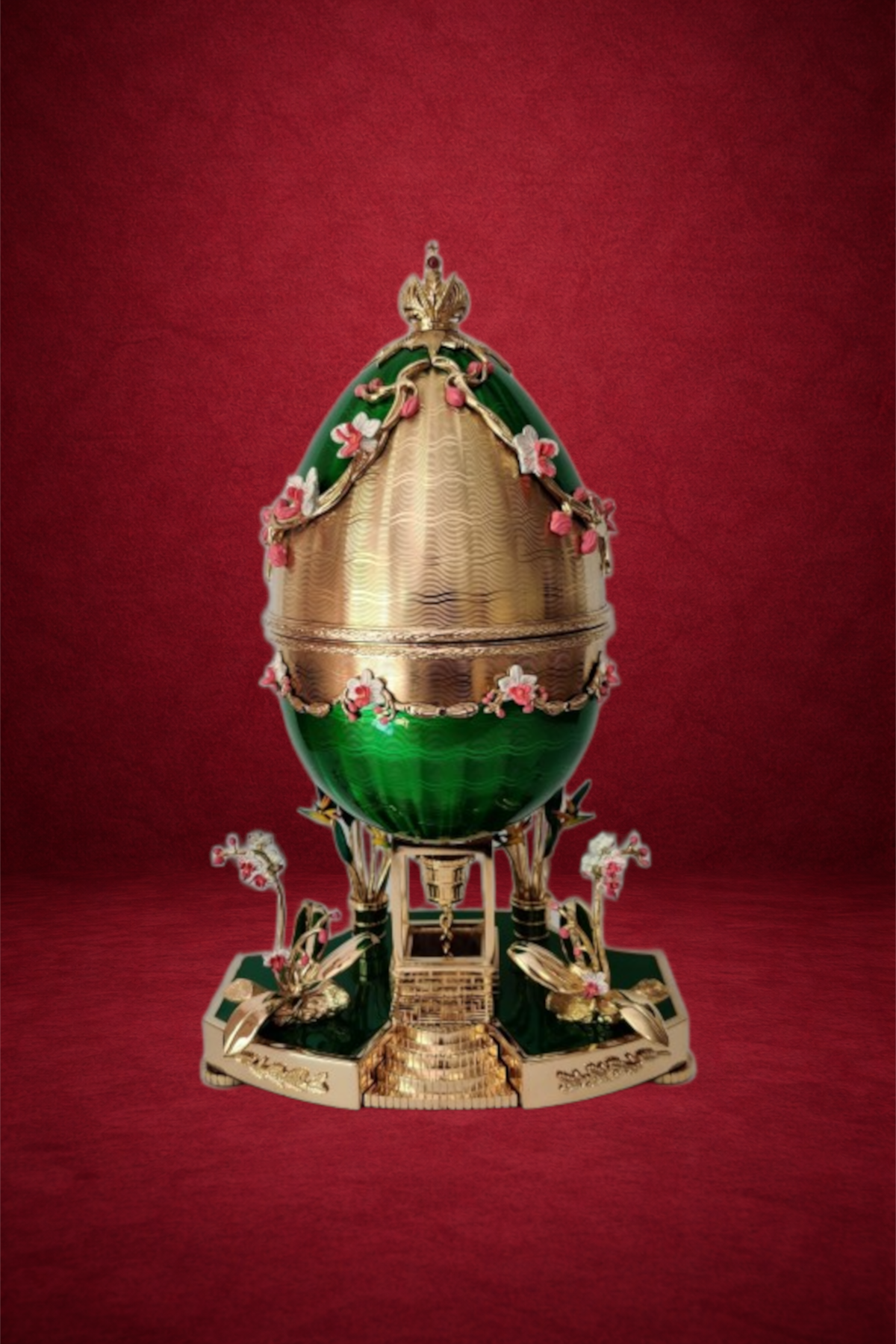 Firebird egg creation by Theo Fabergé inspired by the Russian Firebird legend crafted with vibrant enamel and gold.
