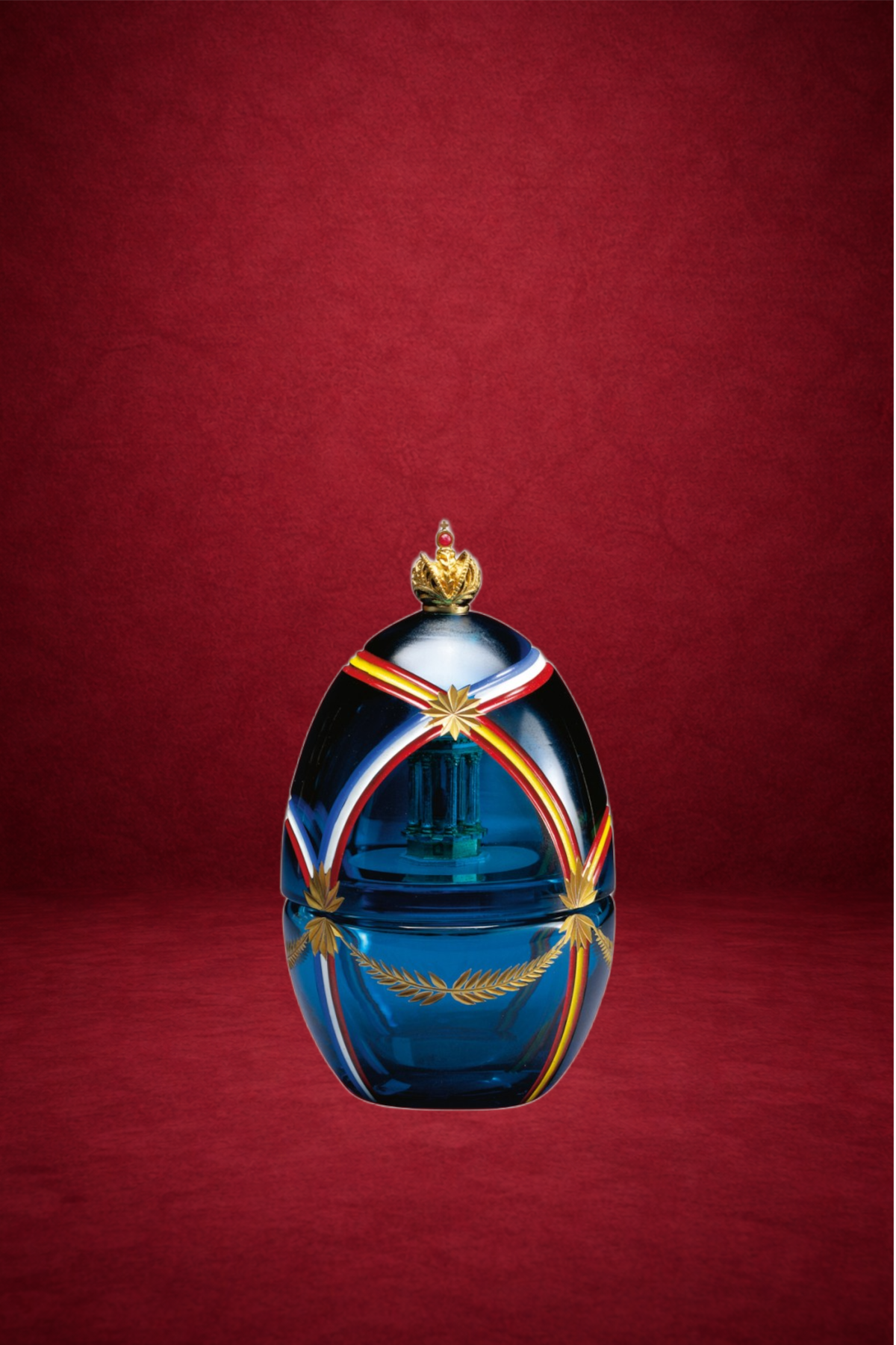 Friendship Egg creation by Theo Fabergé inspired by mythical dragons with intricate gold and enamel craftsmanship.