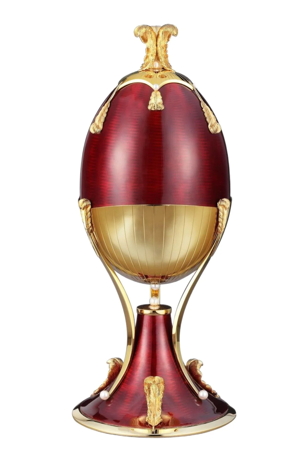 Firebird Passion egg creation by Theo Fabergé inspired by the Russian Firebird legend crafted with vibrant enamel and gold.