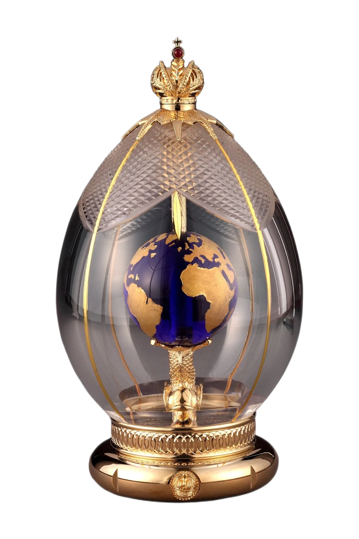 World egg creation by Theo Fabergé featuring a globe motif symbolising global heritage and craftsmanship.