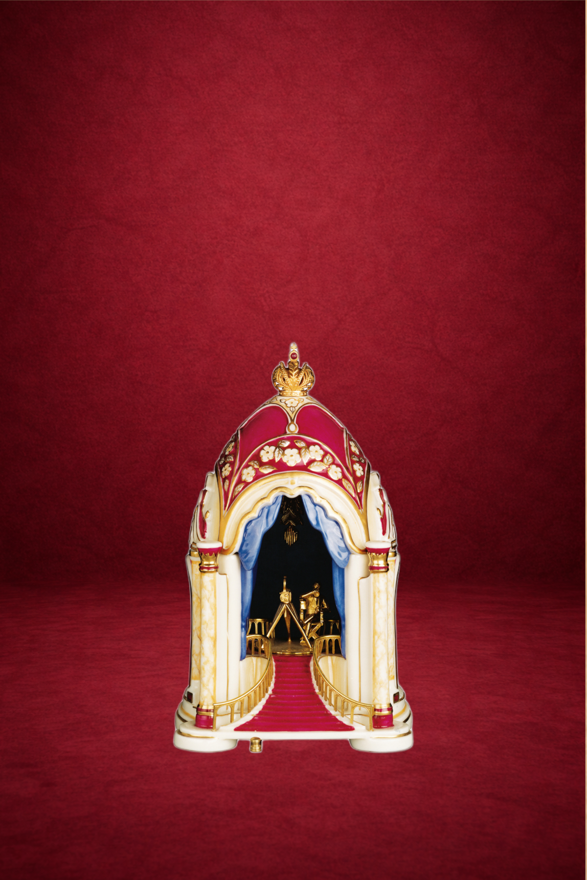Birth Of The Cinema Egg creation by Theo Fabergé inspired by autumn colours and natural motifs in gold and enamel.