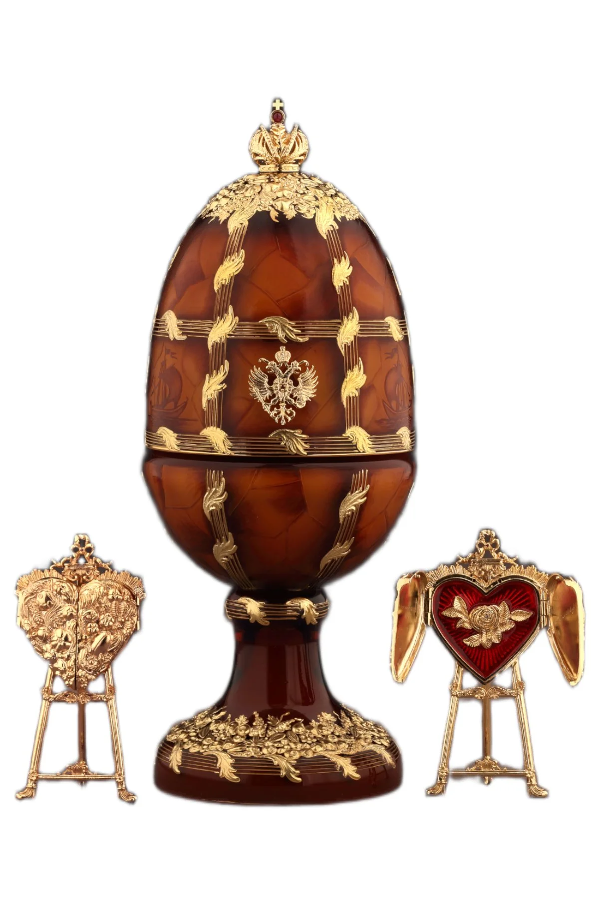 Amber egg creation by Theo Fabergé incorporating warm amber tones and handcrafted enamel and gold detailing.