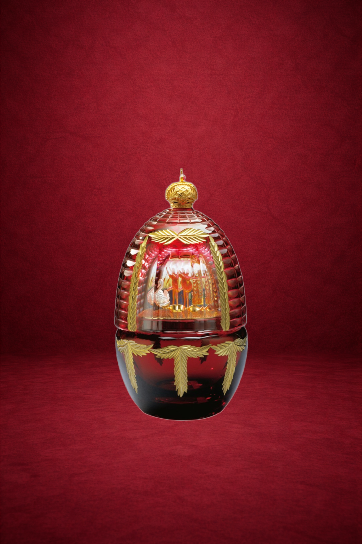 Encore egg creation by Theo Fabergé celebrating theatrical themes with elaborate gold and enamel detailing.
