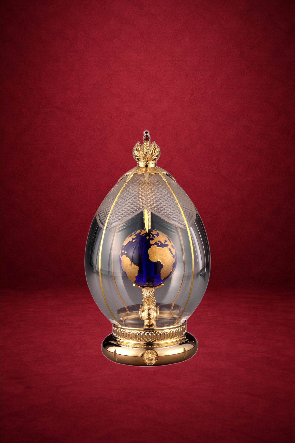 World egg creation by Theo Fabergé featuring a globe motif symbolising global heritage and craftsmanship.