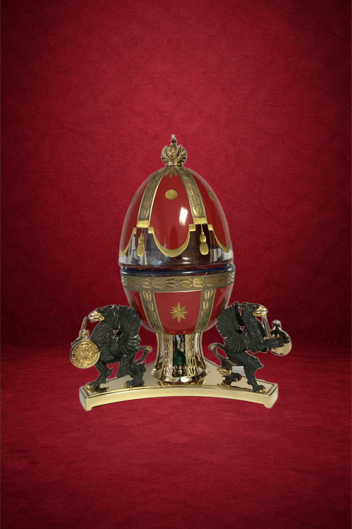 Imperial Romanov egg creation by Theo Fabergé celebrating the Romanov dynasty with elaborate enamel and gold decoration.