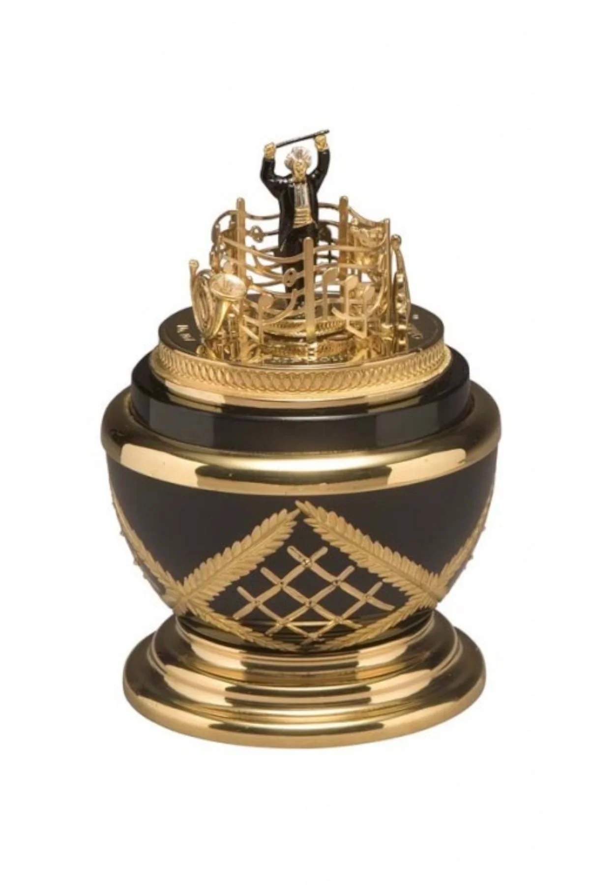 Symphony Egg open to reveal its handcrafted surprise.