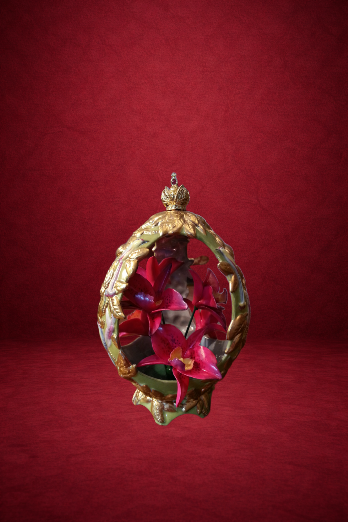 Orchid egg creation by Theo Fabergé inspired by orchid flowers crafted in enamel and gold.