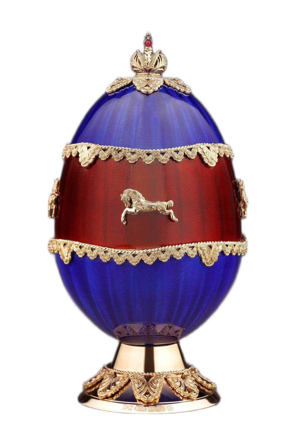 Carousel egg creation by Theo Fabergé inspired by traditional fairground carousel imagery crafted in gold and enamel.
