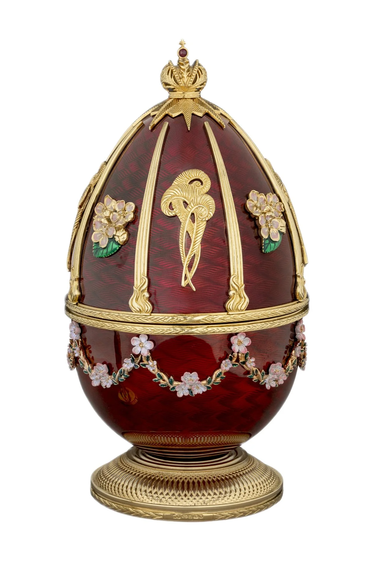 Firebird egg creation by Theo Fabergé inspired by the Russian Firebird legend crafted with vibrant enamel and gold.