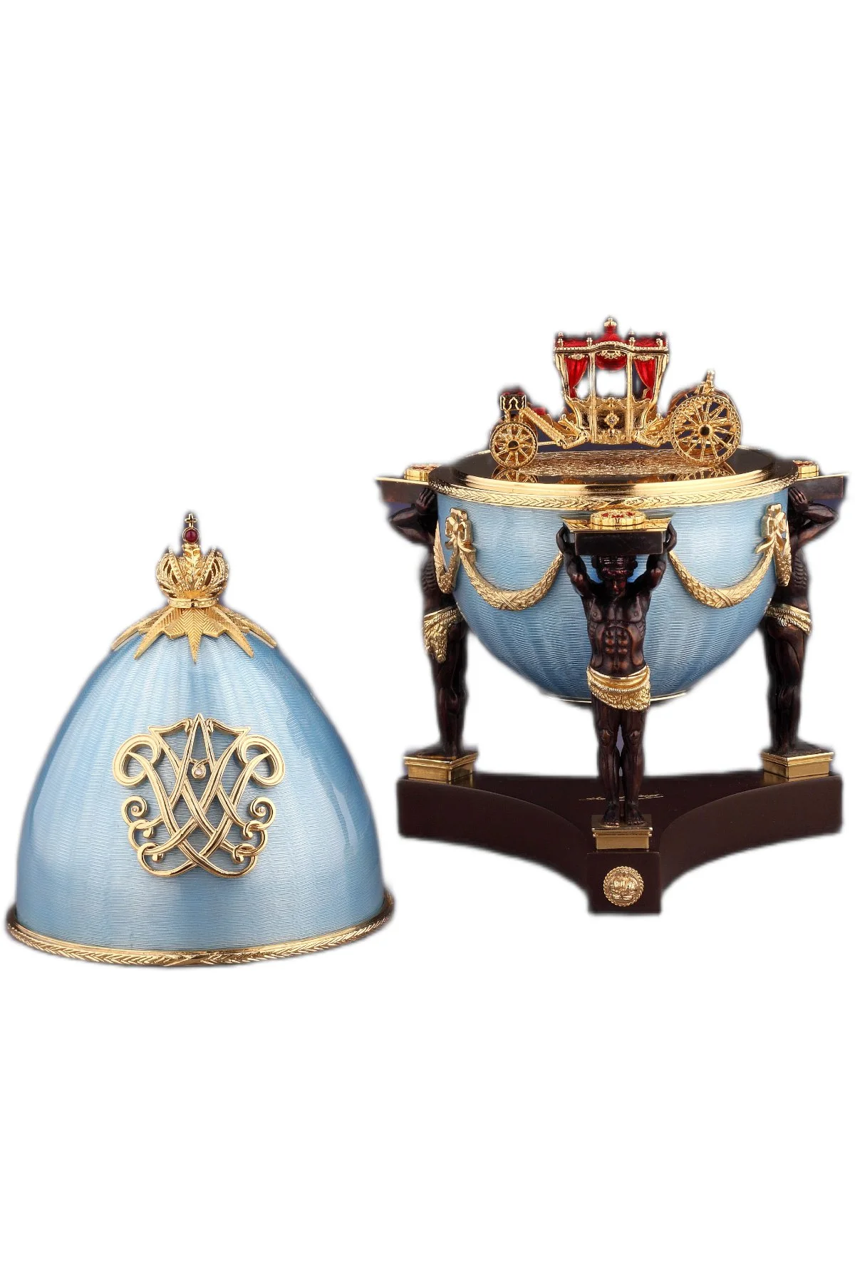 Hermitage Egg open to reveal its handcrafted surprise.
